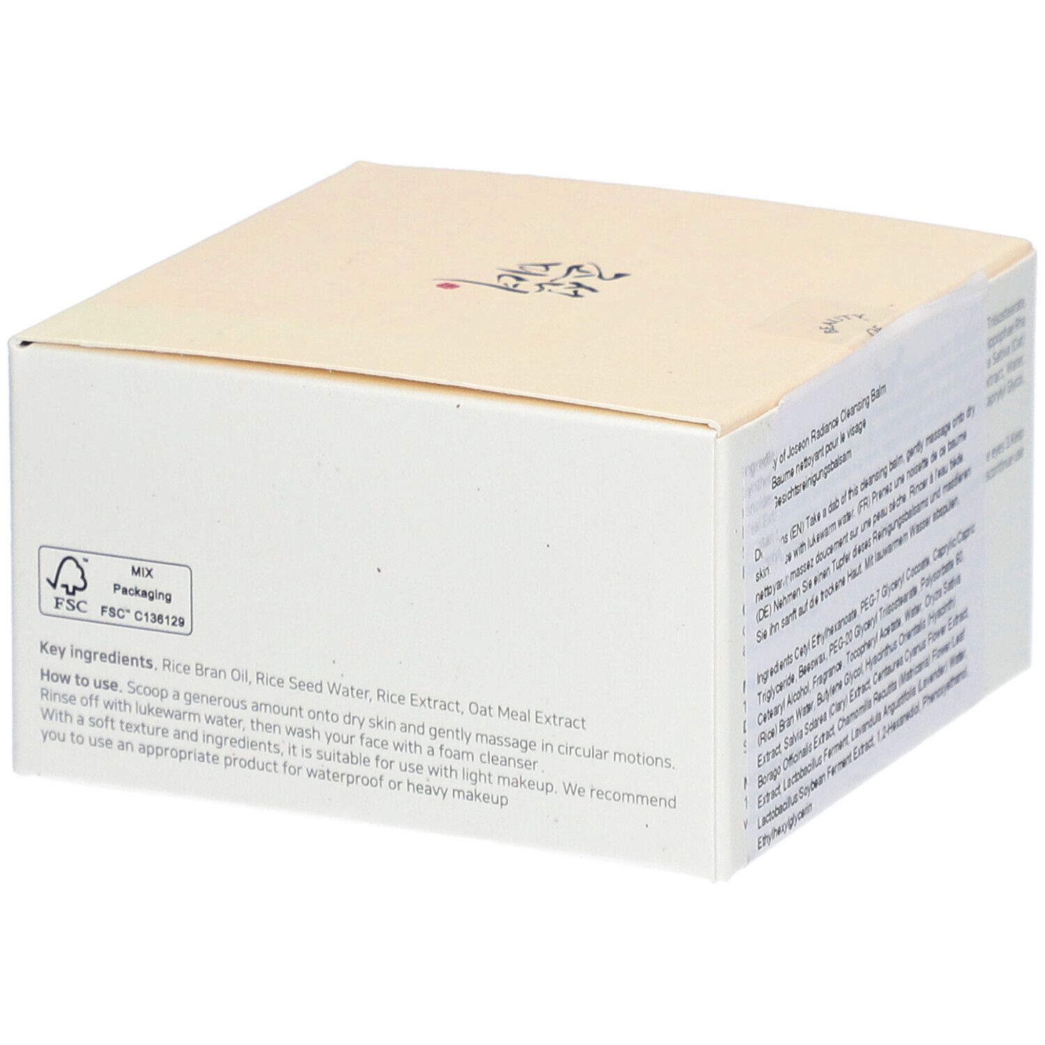 Boîte blanche avec texte coréen et informations produit.