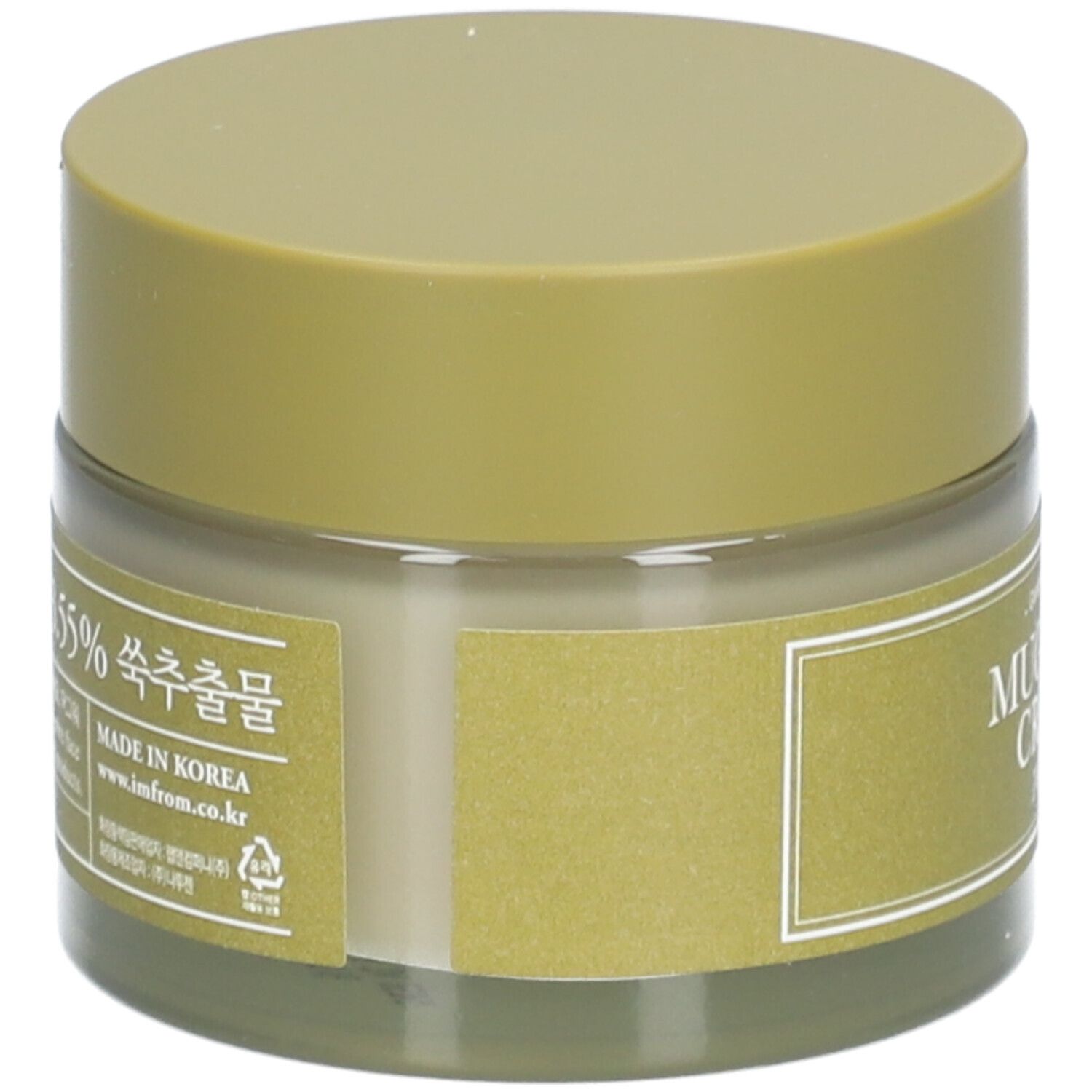 Pot de crème avec couvercle. L'étiquette indique "Mugwort Cream" et "I'm from".