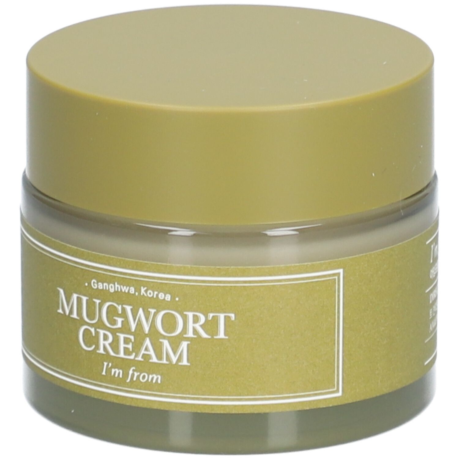 Pot de crème avec couvercle. L'étiquette indique "Mugwort Cream" et "I'm from".
