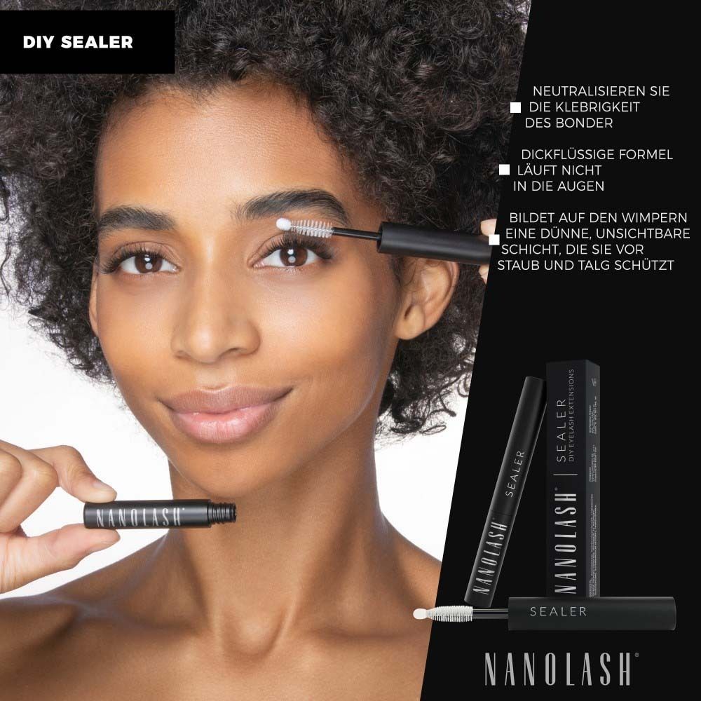 Un applicateur de mascara noir avec une brosse transparente pour sceller une extension de cils.
