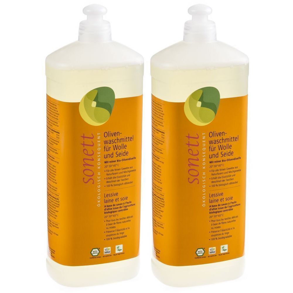 Deux flacons de lessive. Inscription : sonett, lessive à l'huile d'olive pour laine et soie. Logo vert avec olive.