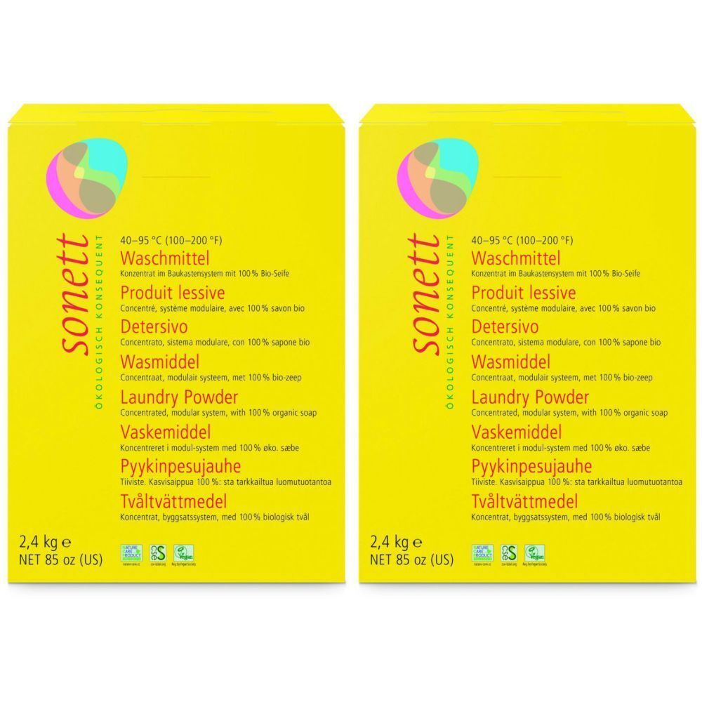 Deux boîtes jaunes de lessive. Inscriptions multilingues, dont "sonett" et "Laundry Powder".