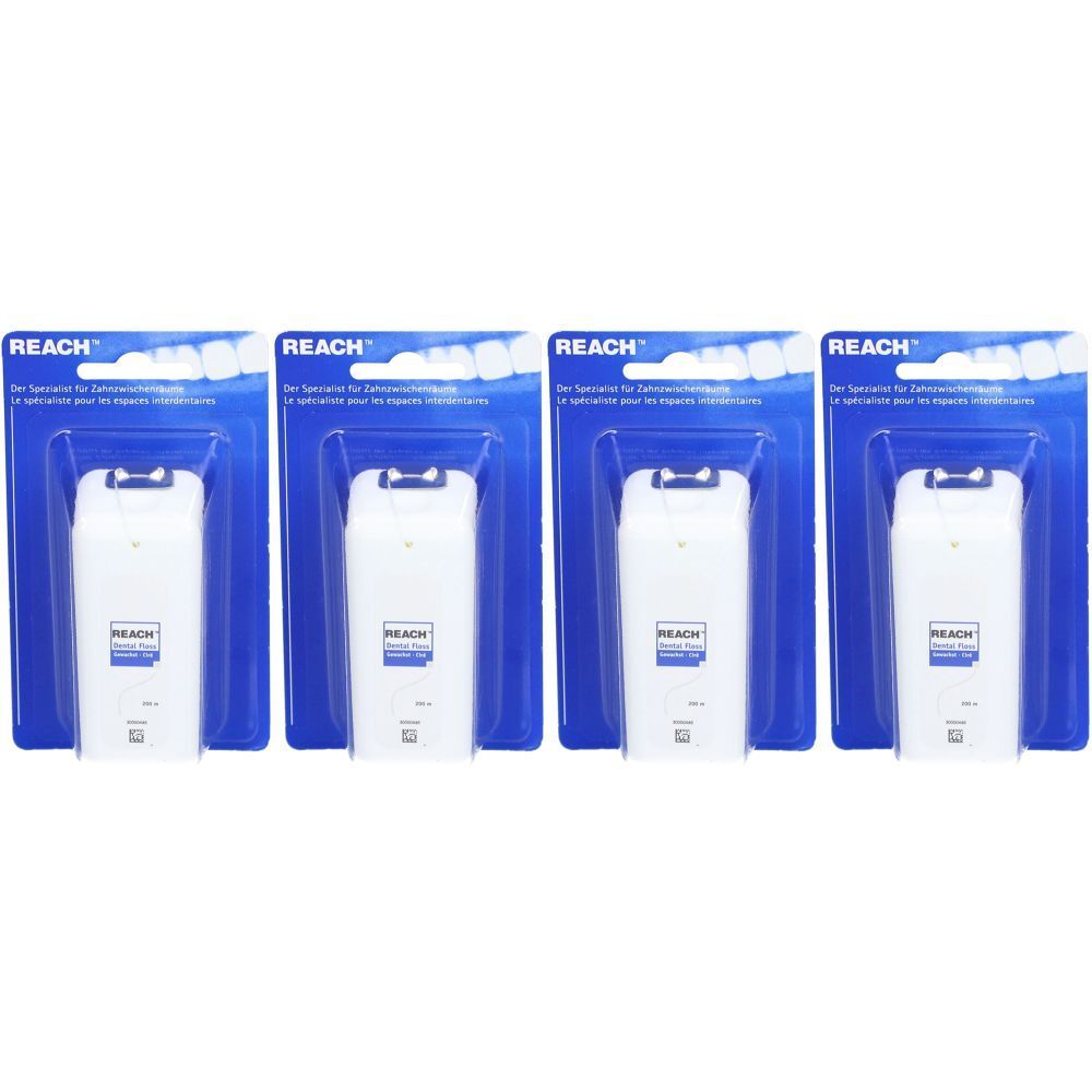 Quatre paquets de fil dentaire. Récipients en plastique blanc dans un emballage bleu. Marque REACH™ visible.