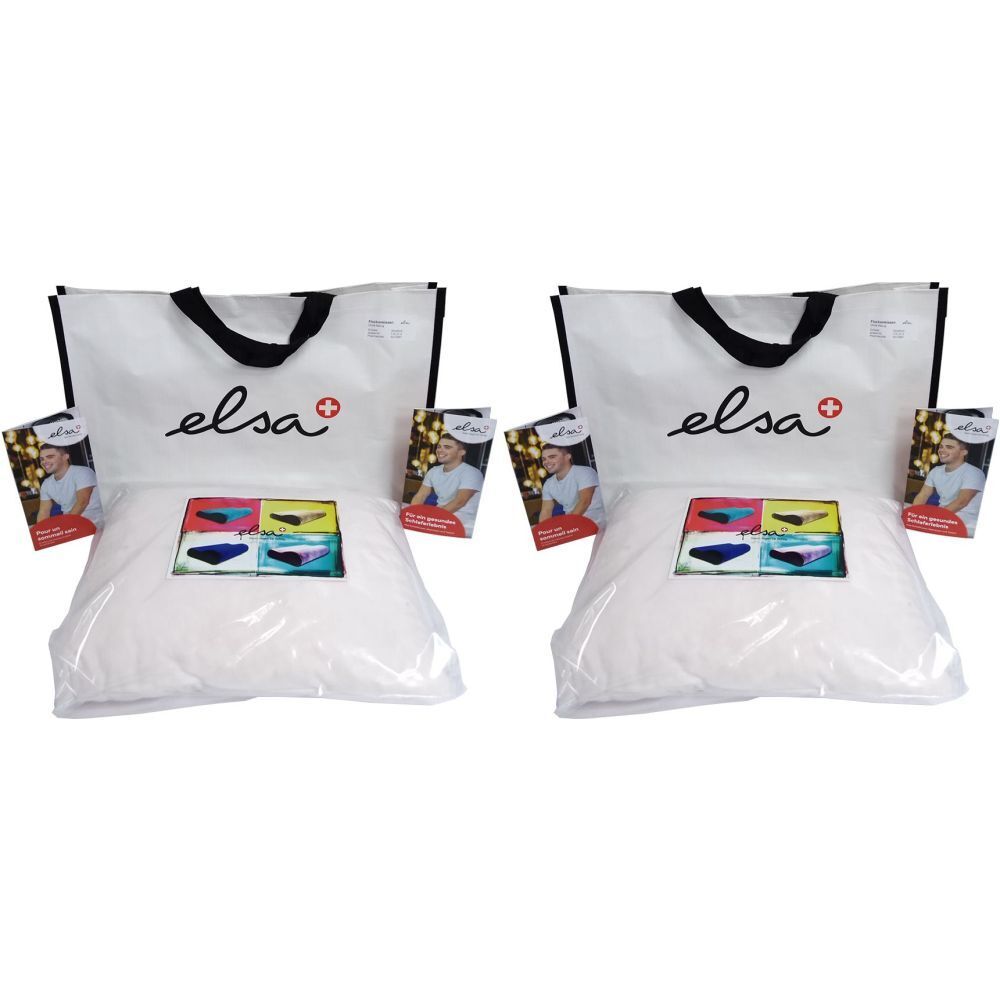 Deux oreillers blancs emballés, avec coussins colorés, sacs et brochures. Marque "elsa".