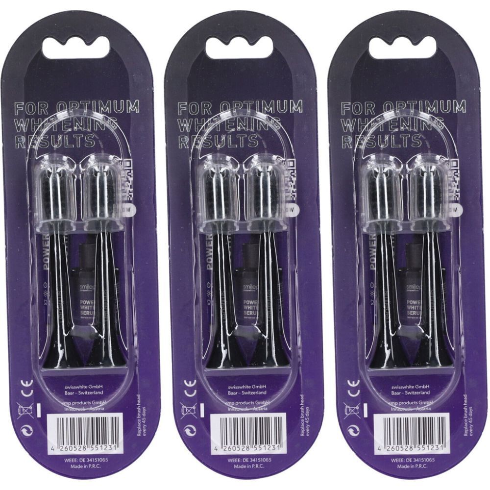 Trois emballages de têtes de brosse à dents noires en blister. Inscription : FOR OPTIMUM WHITENING RESULTS.