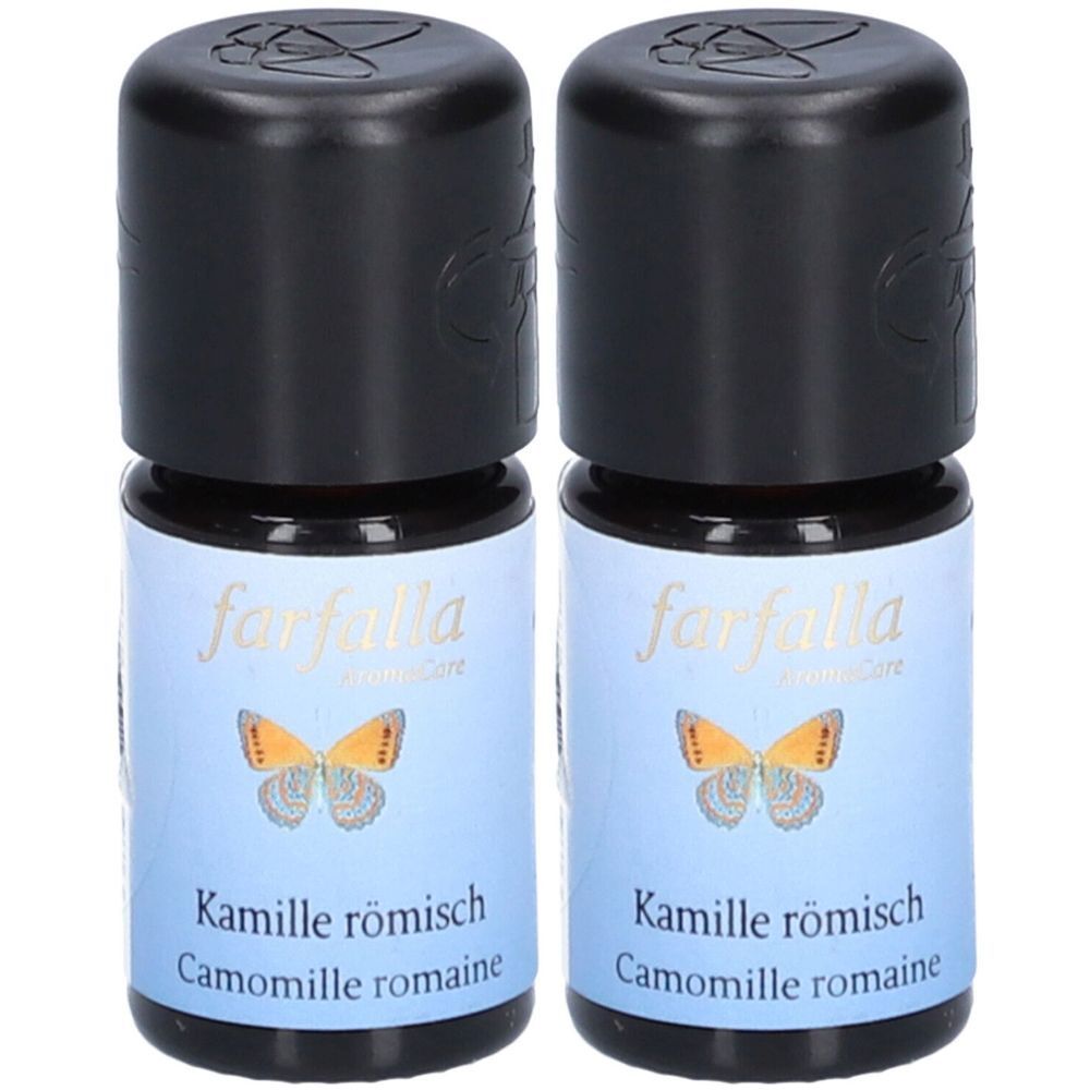 Deux flacons avec bouchons noirs. L'étiquette indique "farfalla", "Kamille römisch" et un papillon.