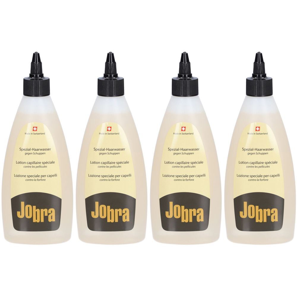 Quatre flacons avec bouchon noir. Inscription: JOBRA, Lotion capillaire spéciale contre les pellicules. Croix suisse.