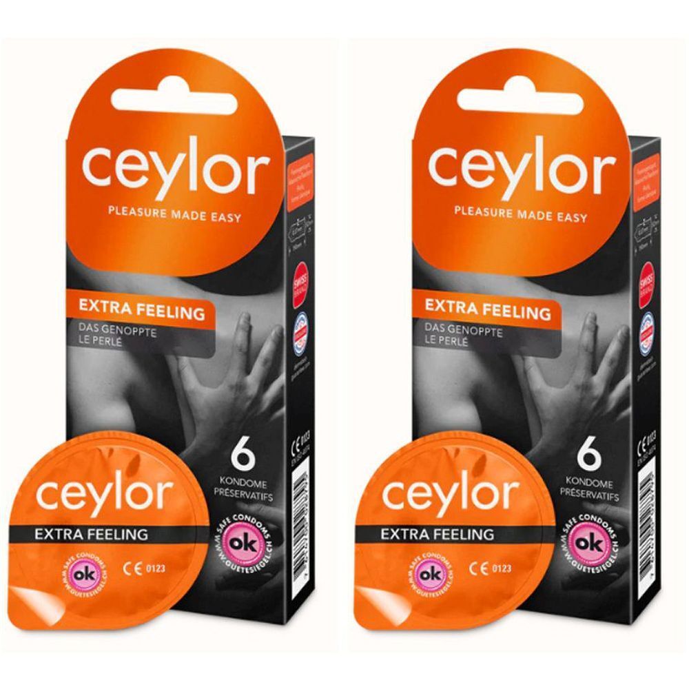 Deux boîtes de préservatifs Ceylor Extra Feeling. Emballage orange avec nom du produit et 6 préservatifs.