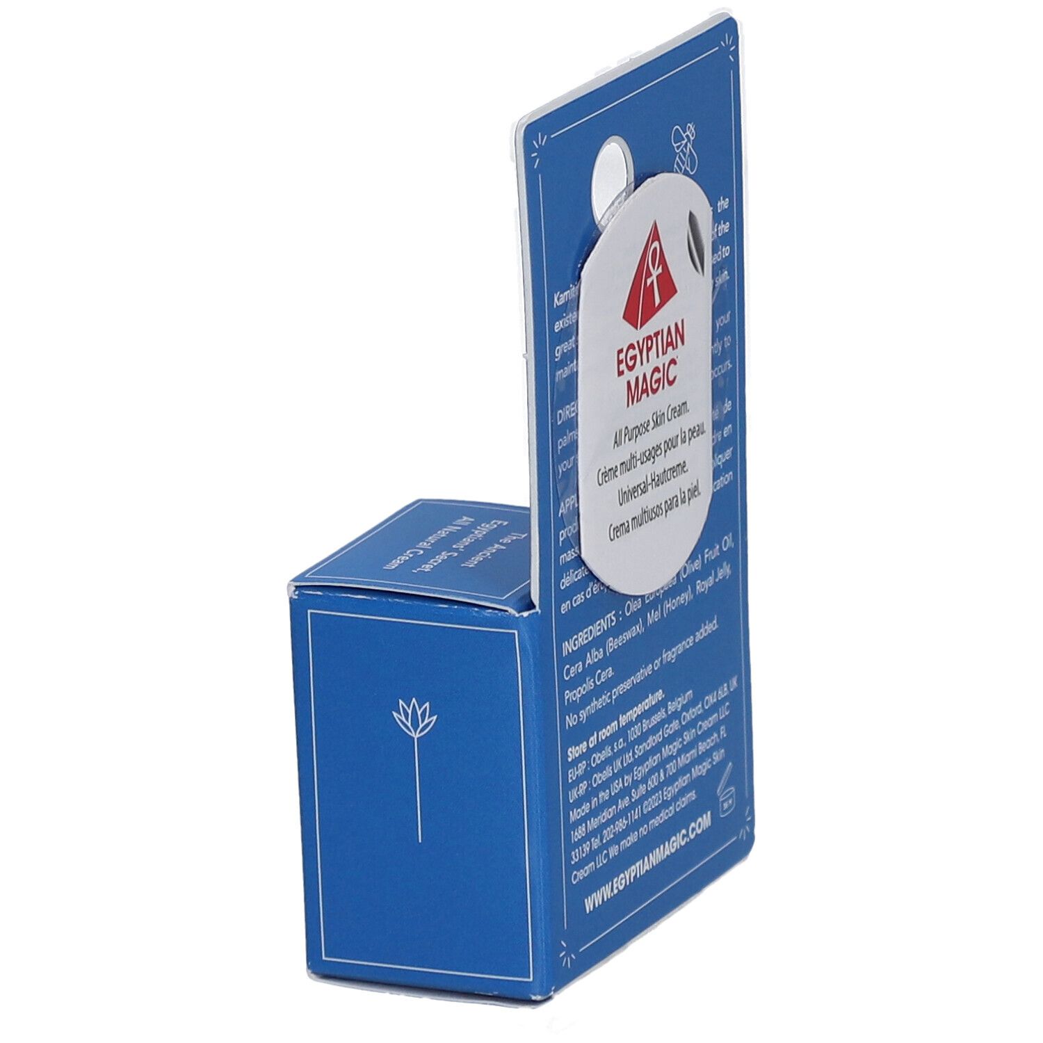 Présentoir en carton bleu avec crème. Inscription : Egyptian Magic, All Purpose Skin Cream. Dos avec texte et logo.