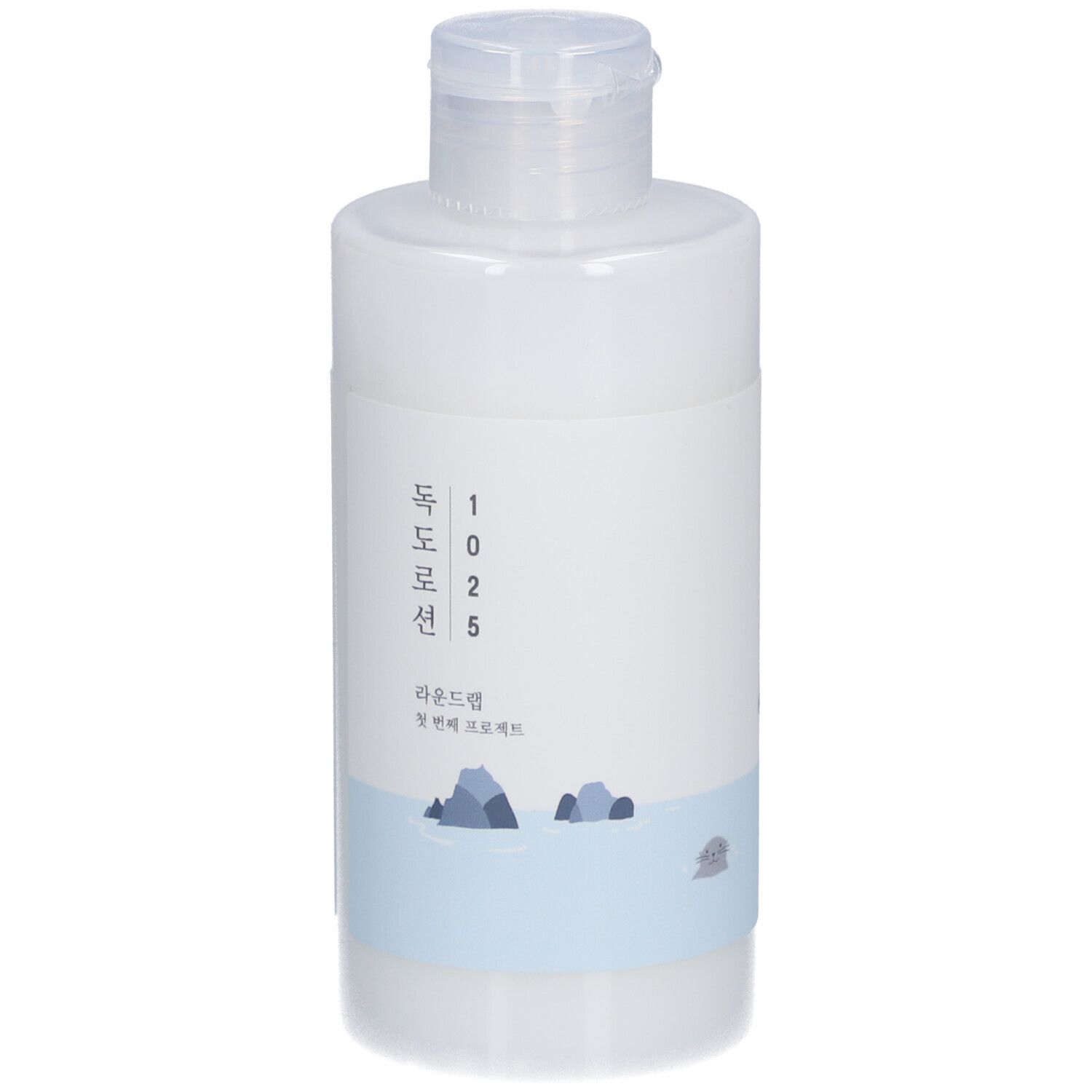 Flacon de lotion blanc avec bouchon rabattable. Bande bleue avec illustration de rochers. Caractères coréens.