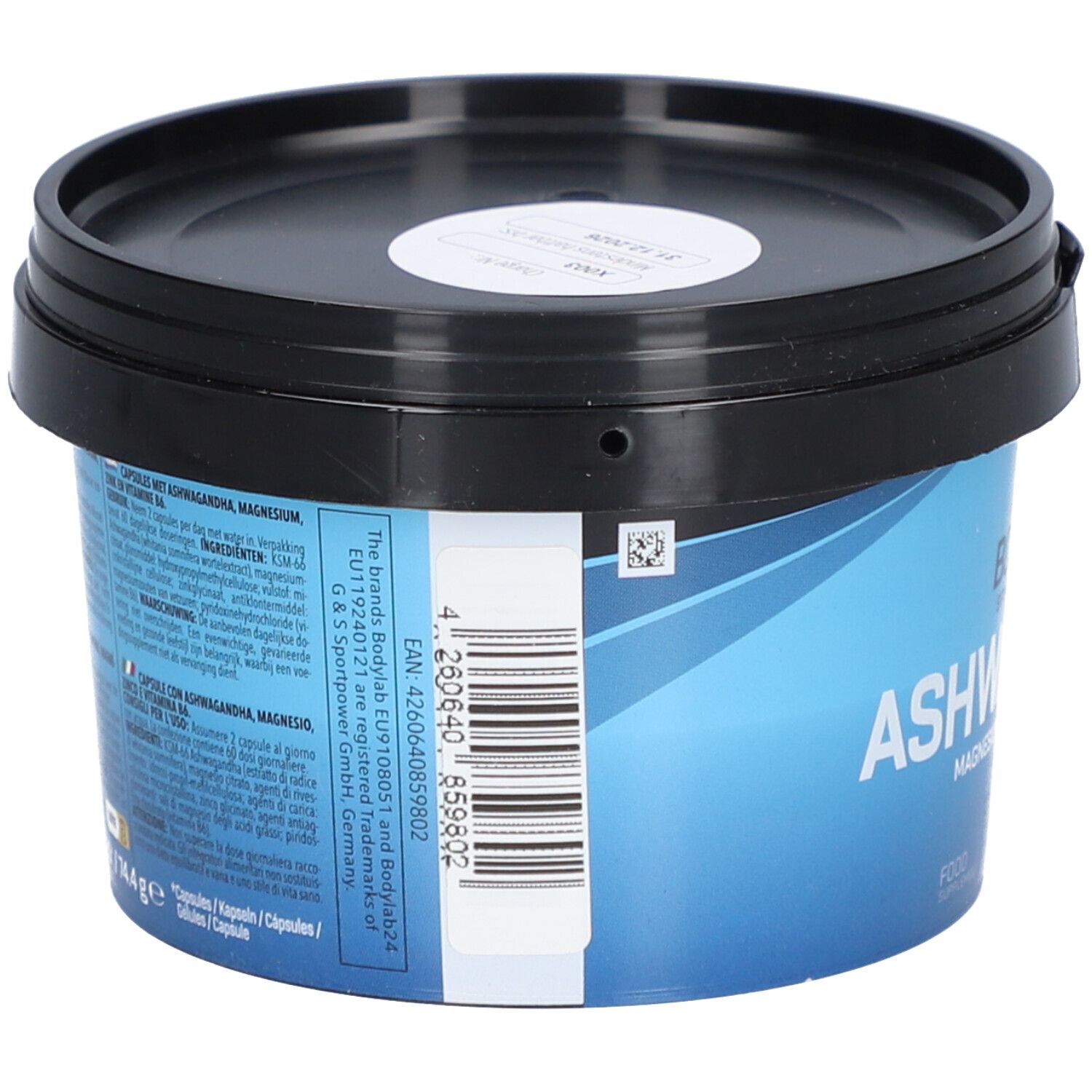 Récipient bleu avec couvercle noir. Inscription : BODYLAB Ashwagandha, Magnésium, Zinc, Vitamine B6. Texte au dos.