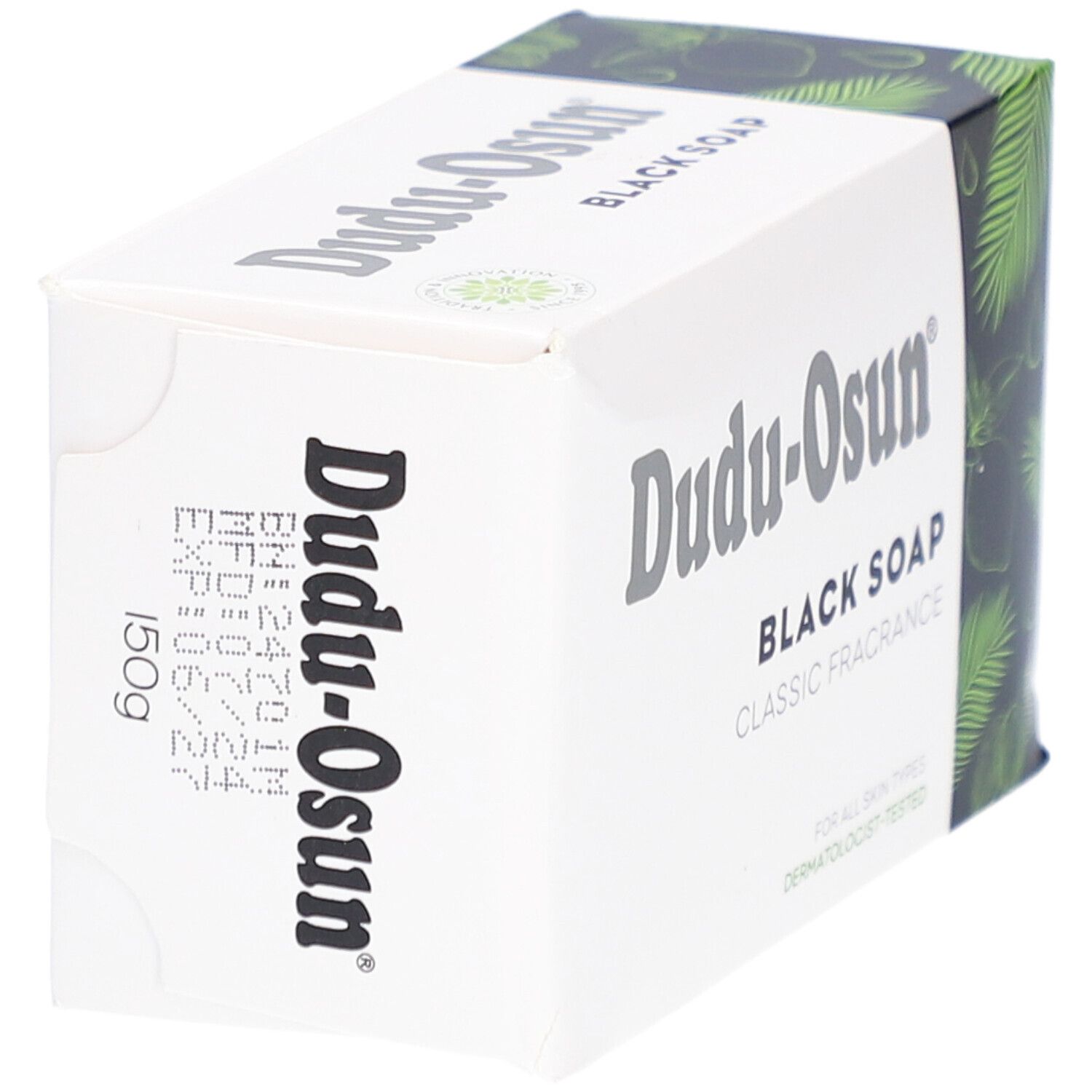 Emballage de savon noir Dudu-Osun. Boîte blanche avec nom et logo du produit. Côté noir avec motifs végétaux.