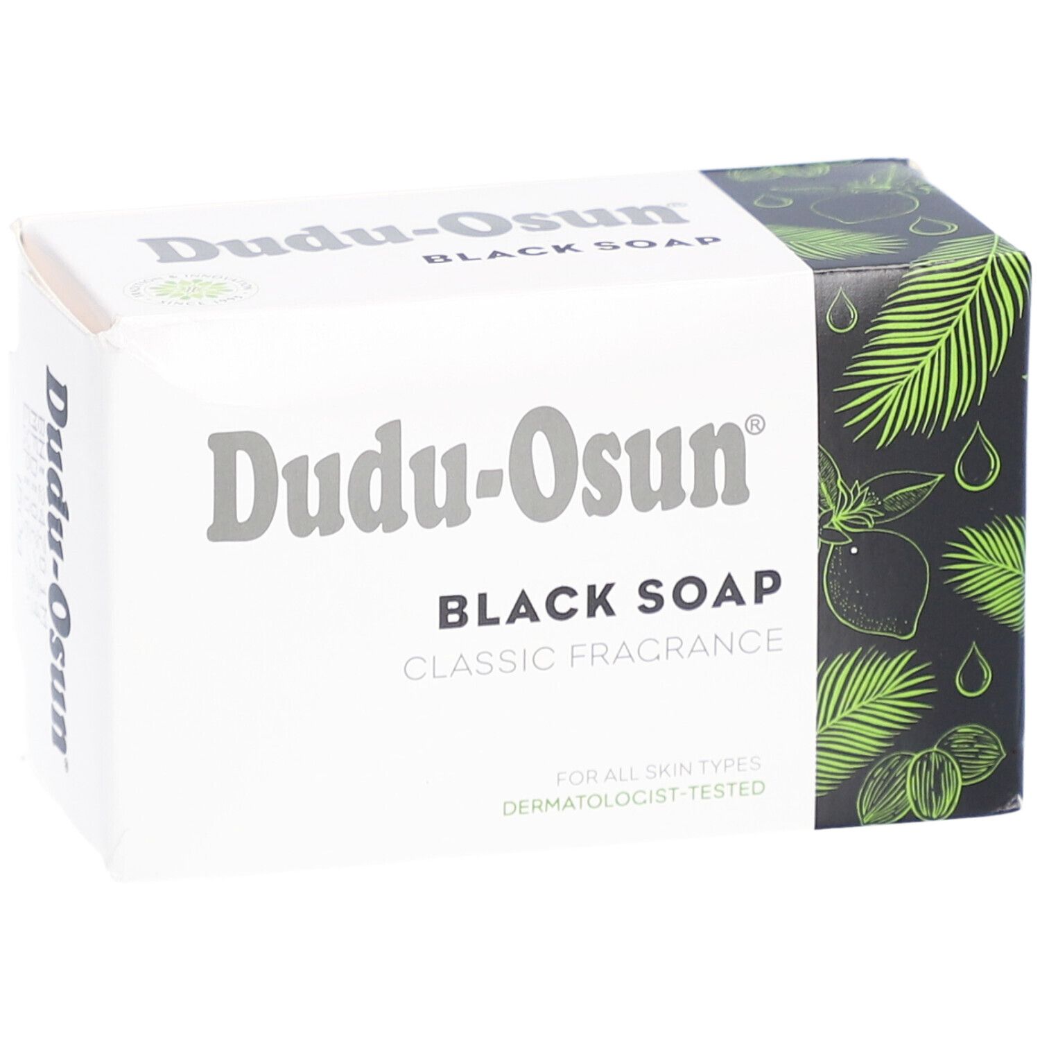 Emballage de savon noir Dudu-Osun. Boîte blanche avec nom et logo du produit. Côté noir avec motifs végétaux.