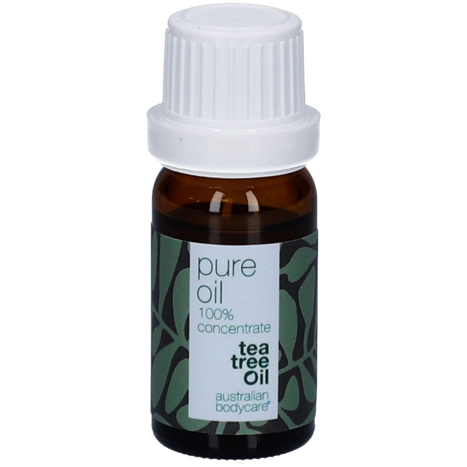 Flacon en verre brun avec bouchon blanc. Étiquette « pure oil 100% concentrate tea tree oil ».