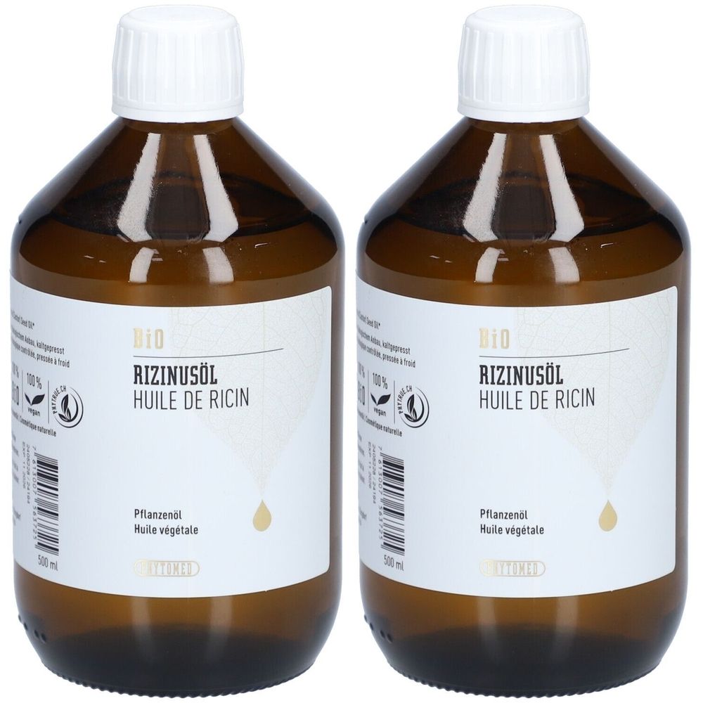 Deux flacons en verre brun avec bouchons blancs. Étiquettes : "BIO RIZINUSÖL HUILE DE RICIN".