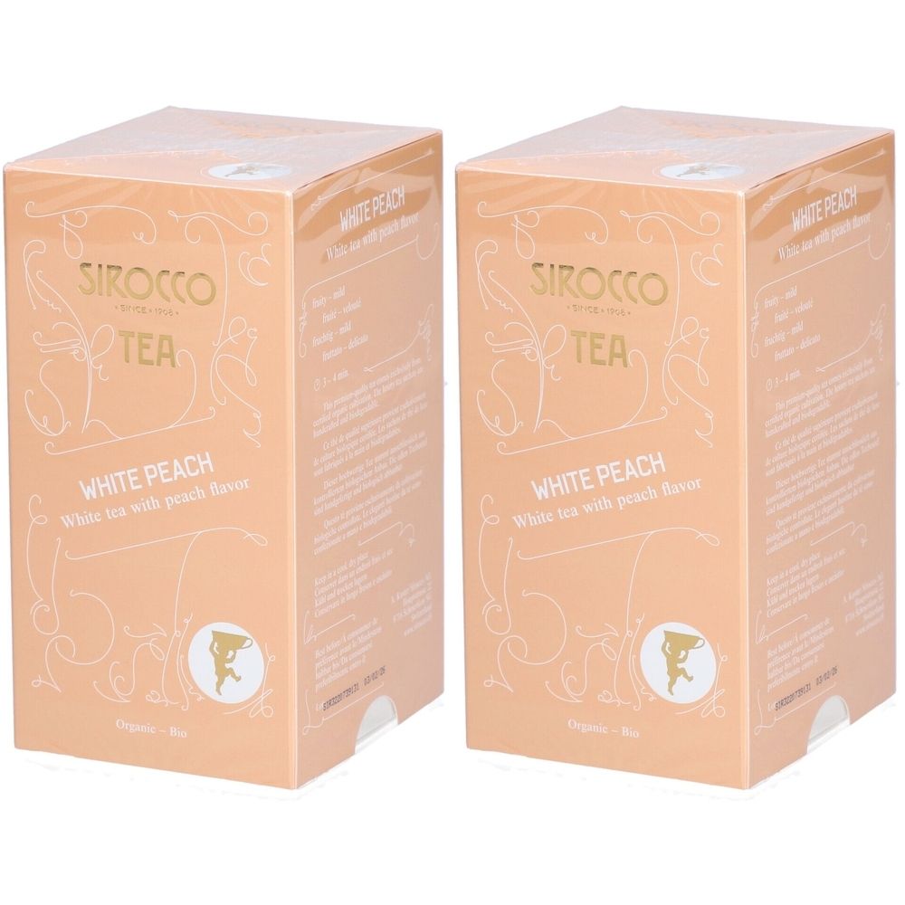 Deux boîtes de thé SIROCCO, saveur thé blanc pêche. Inscription: WHITE PEACH. Emballage beige et or.