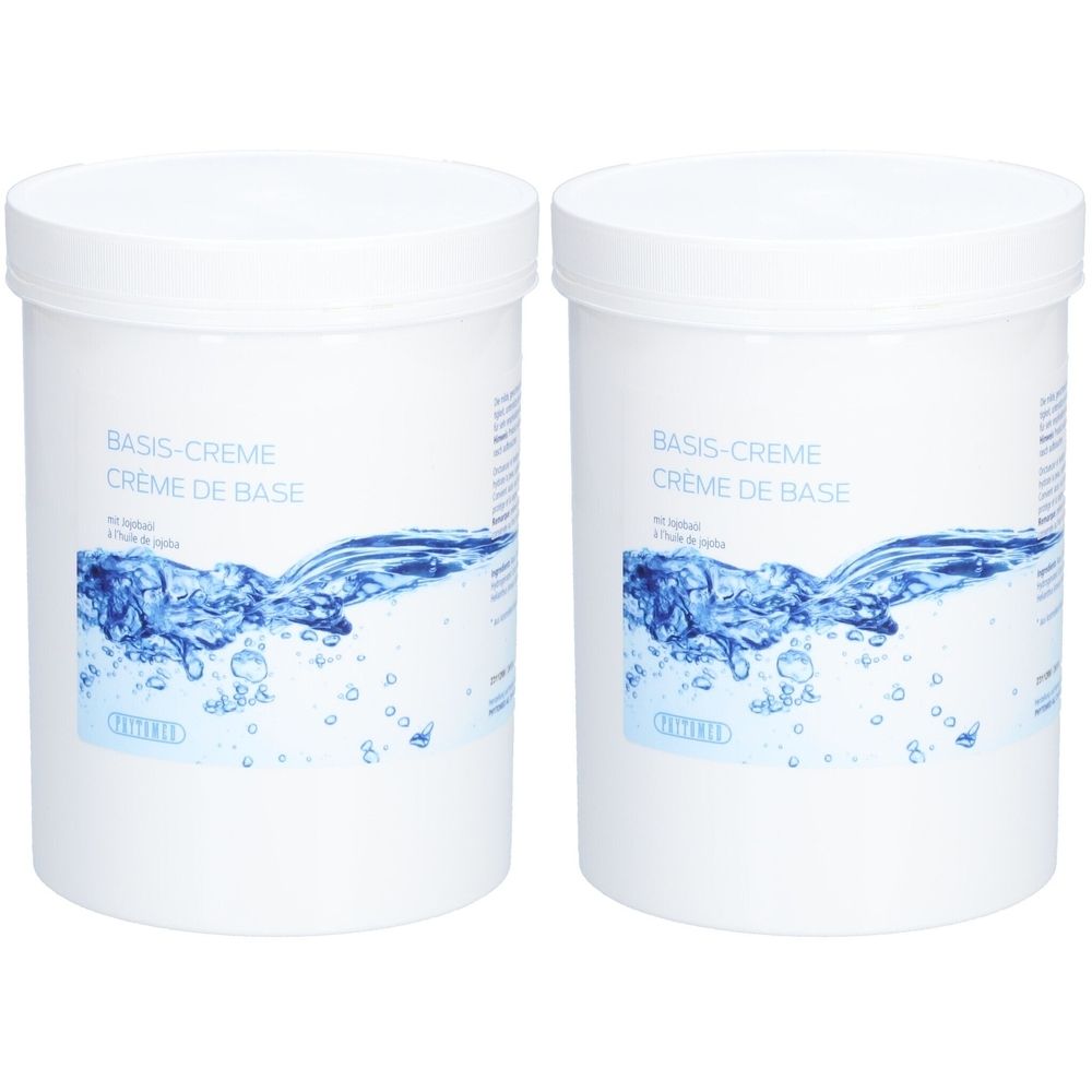 Deux pots blancs avec couvercles. Inscription: Basis-Creme, Crème de Base. En dessous, motif d'eau bleu. Marque: PHYTOMED.