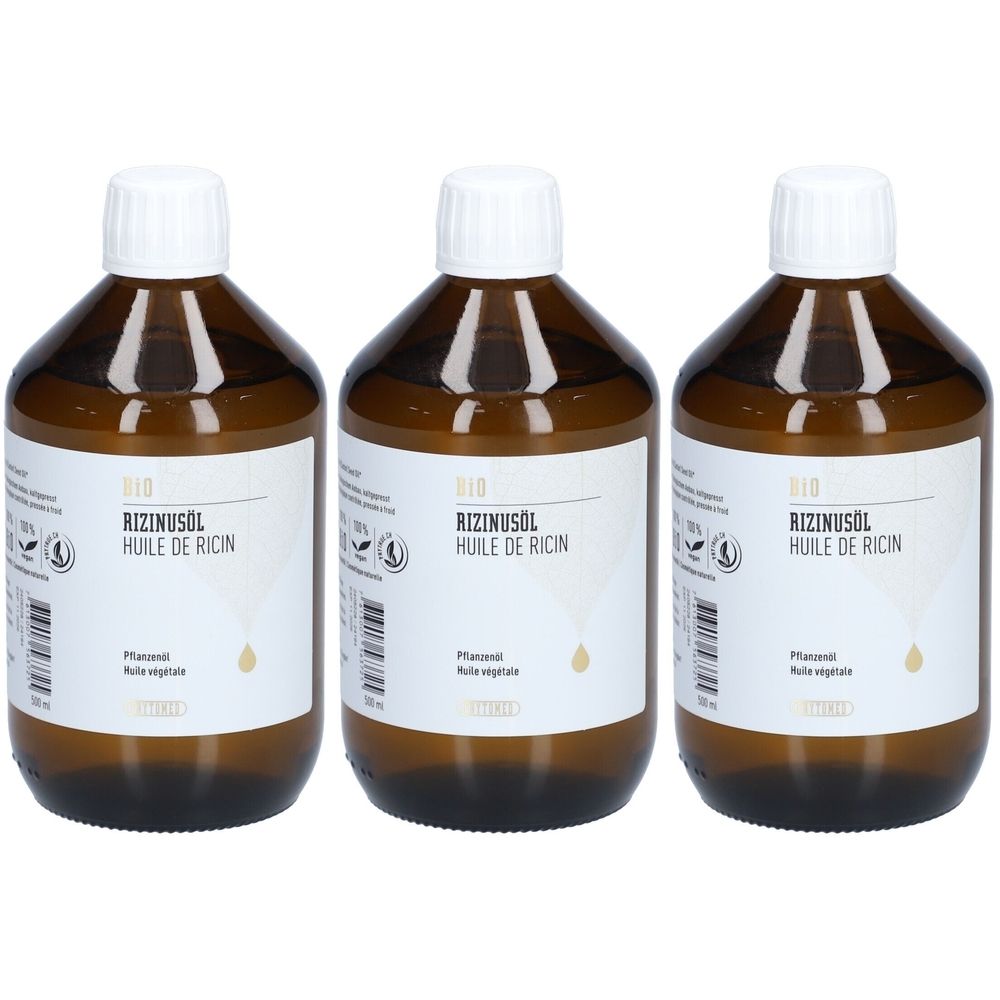 Trois flacons en verre brun avec bouchon blanc et étiquette. Inscription : Huile de Ricin.
