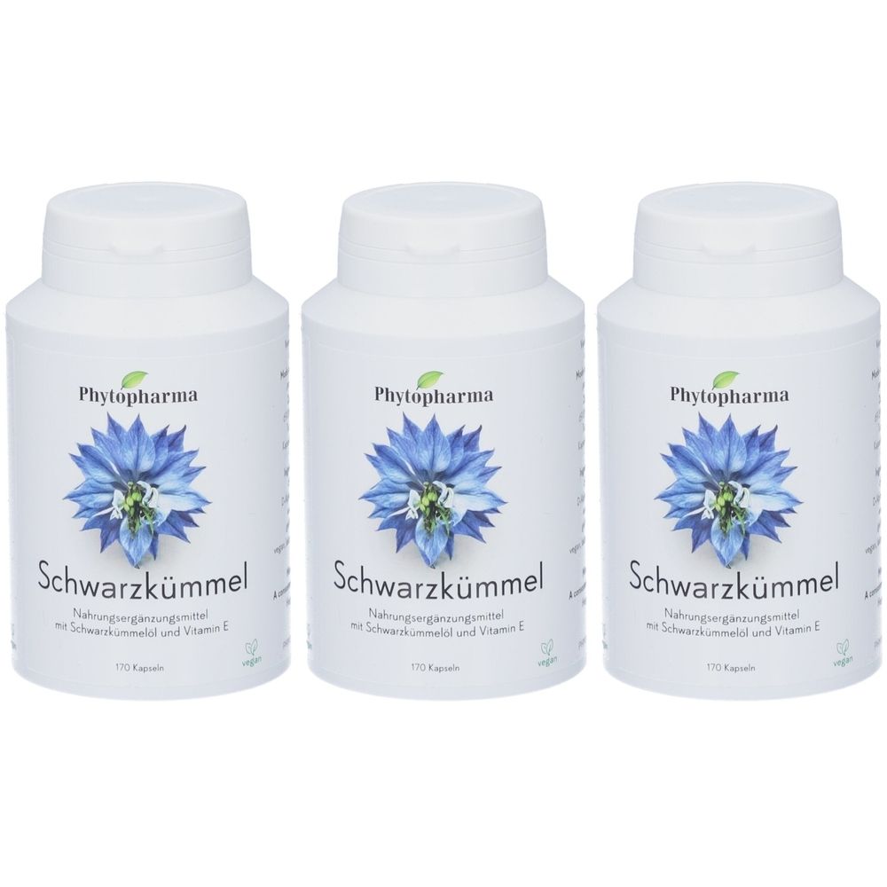 Trois flacons blancs avec motif floral bleu. Inscription: Phytopharma, Schwarzkümmel. Complément alimentaire avec cumin noir et vitamine E.