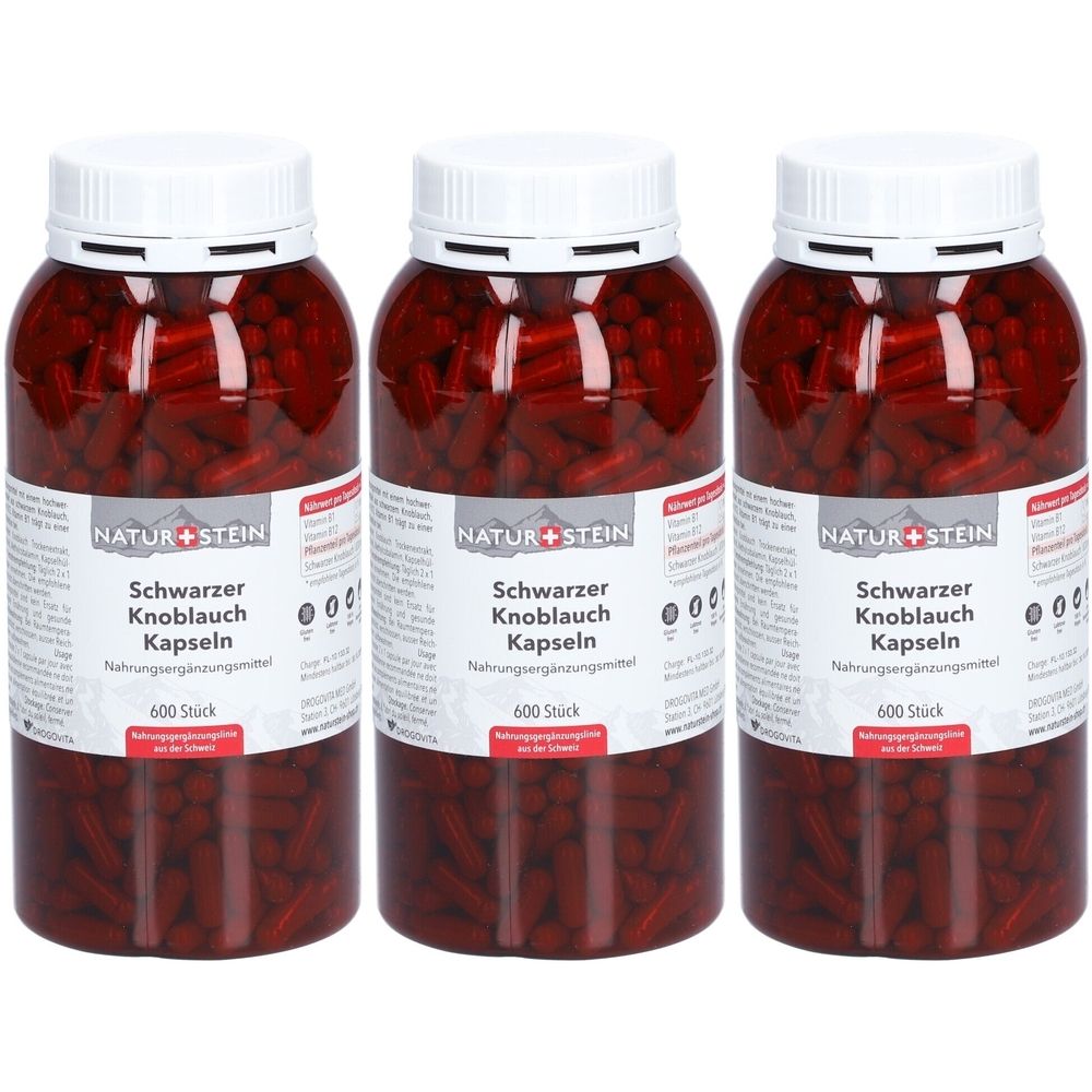 Trois flacons de gélules de NATUR+STEIN Schwarzer Knoblauch. Chaque flacon contient 600 pièces. Bouchons blancs, gélules rouges visibles.