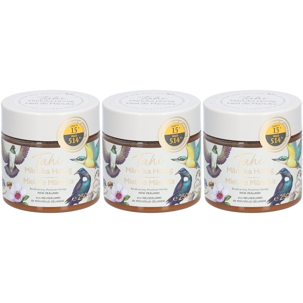 Trois pots de miel. Inscription: Tahi Manuka Honey, UMF 15+, MGO 514+. Motifs d'oiseaux et de fleurs.
