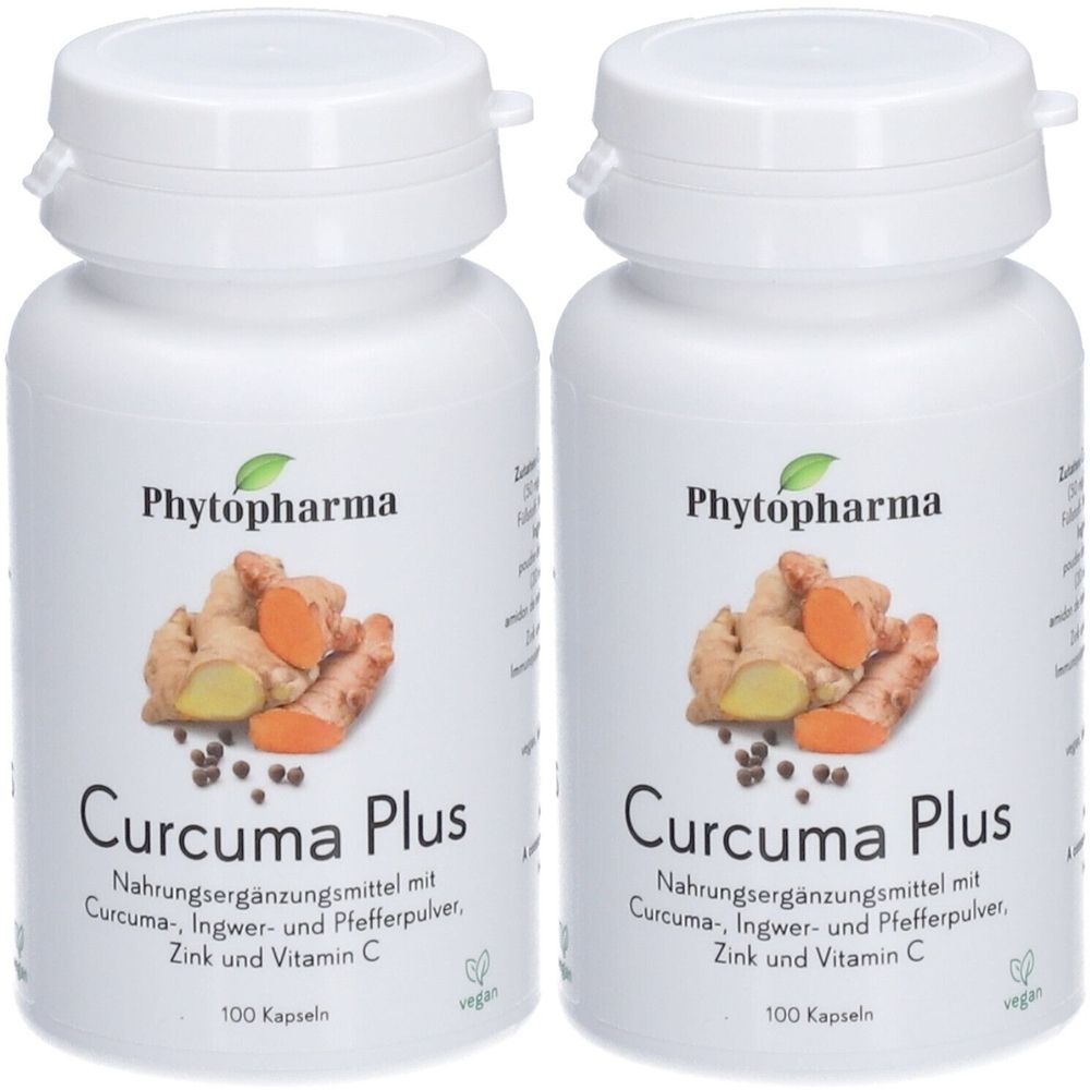 Deux flacons blancs avec le nom du produit Curcuma Plus. Inscription : Phytopharma. Contient du curcuma, du gingembre, de la poudre de poivre, du zinc et de la vitamine C. 100 gélules.