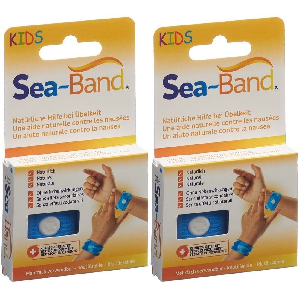 Deux boîtes de bracelets Sea-Band pour enfants. Bracelets bleus avec bouton pression. Emballage avec nom du produit et texte en allemand, français, italien.