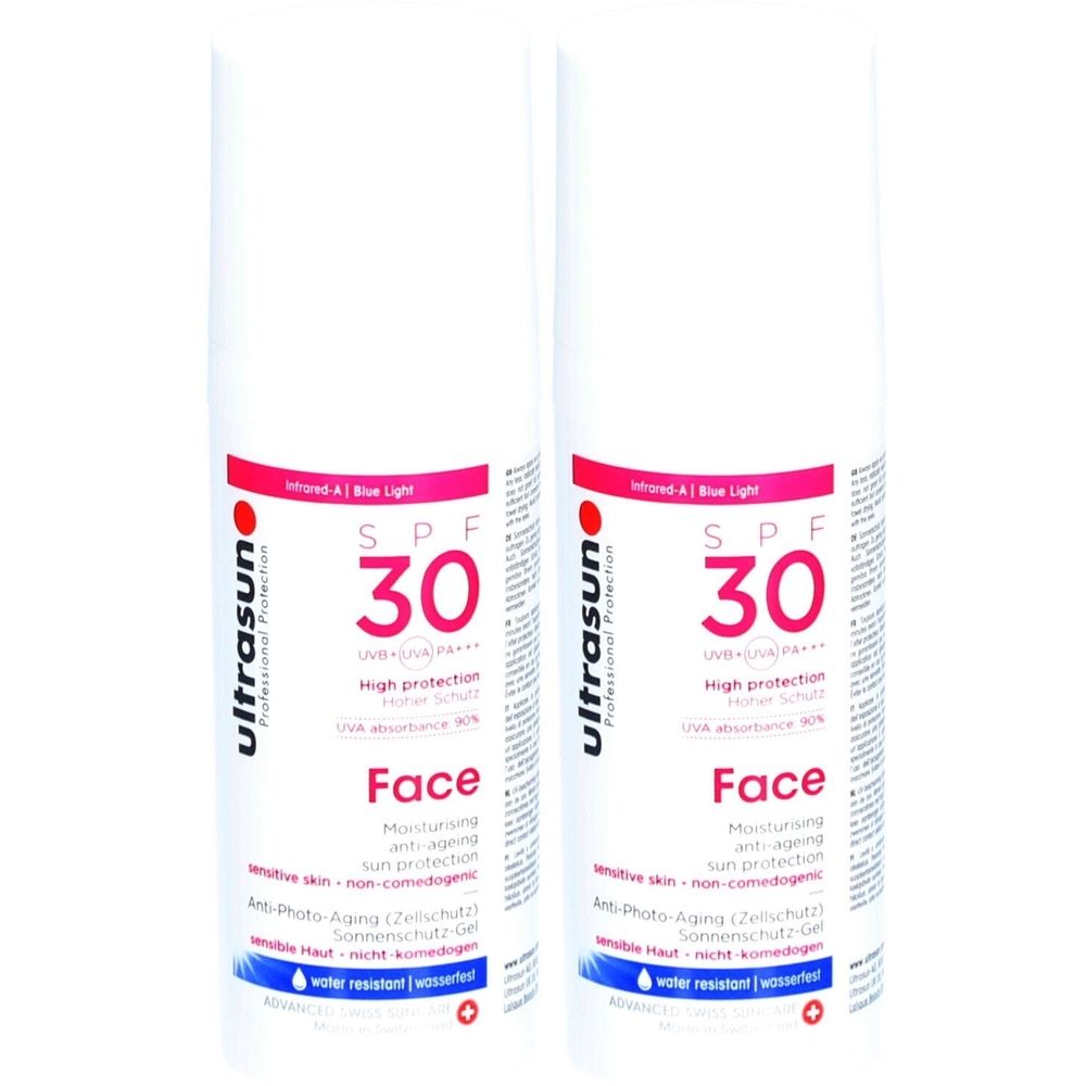 Deux flacons blancs avec texte rouge et noir. Inscription: SPF 30, Face, ultrasun. Protection solaire.