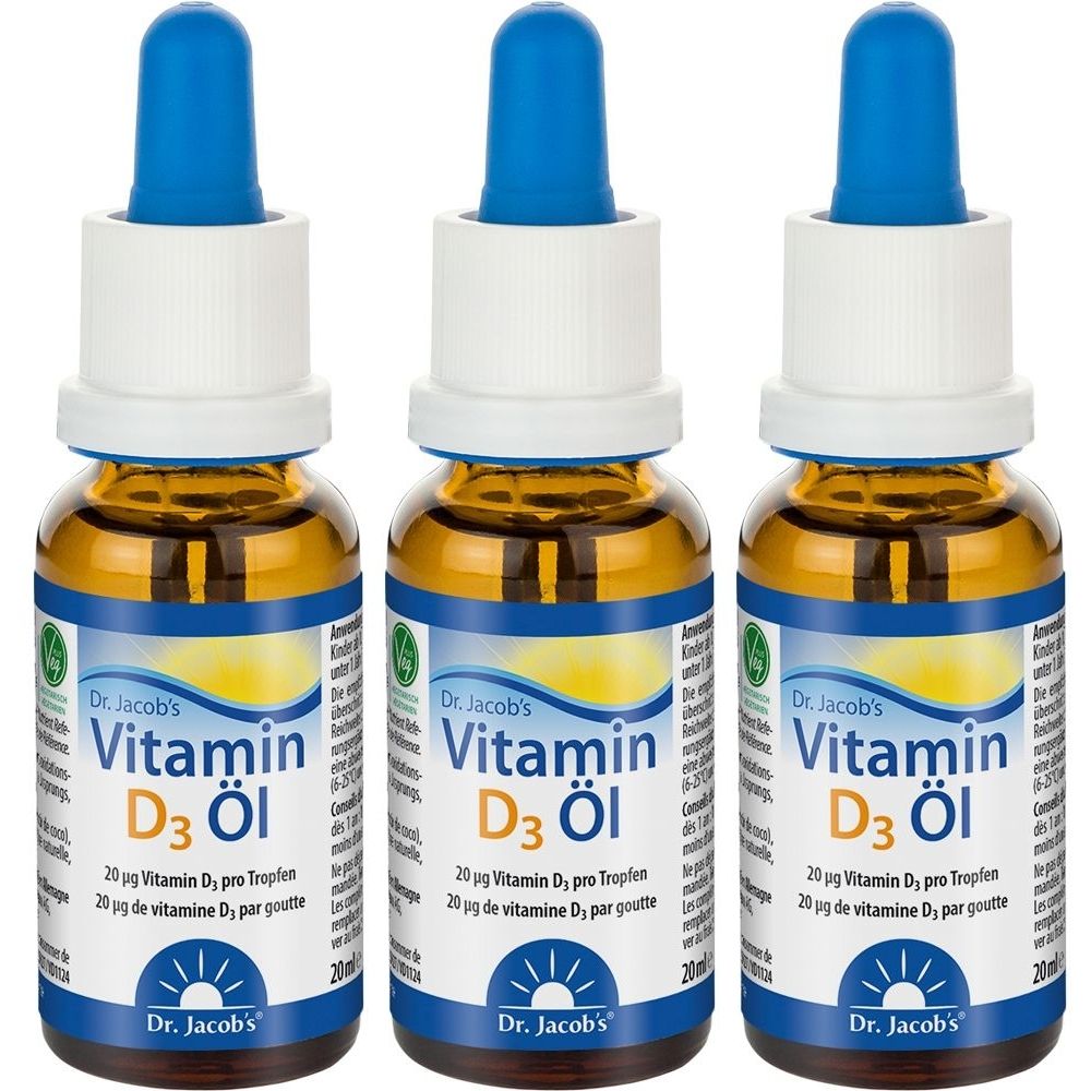 Trois flacons de Dr. Jacob's Vitamin D3 Öl. Flacons en verre brun avec compte-gouttes bleus et bouchons blancs. Étiquettes avec informations sur le produit.