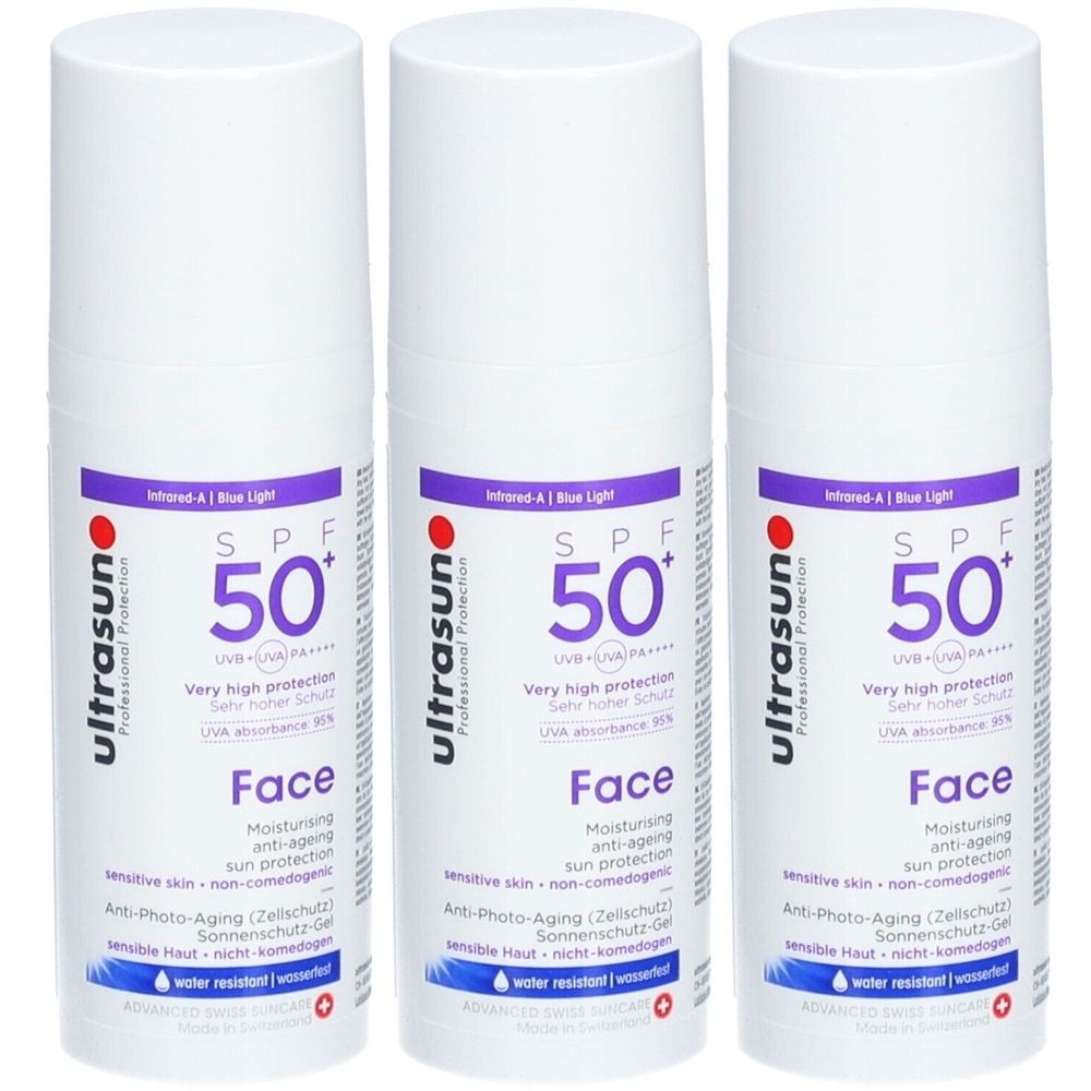 Trois flacons blancs de crème solaire. Chaque flacon porte l'inscription "ultrasun", "SPF 50+" et "Face".