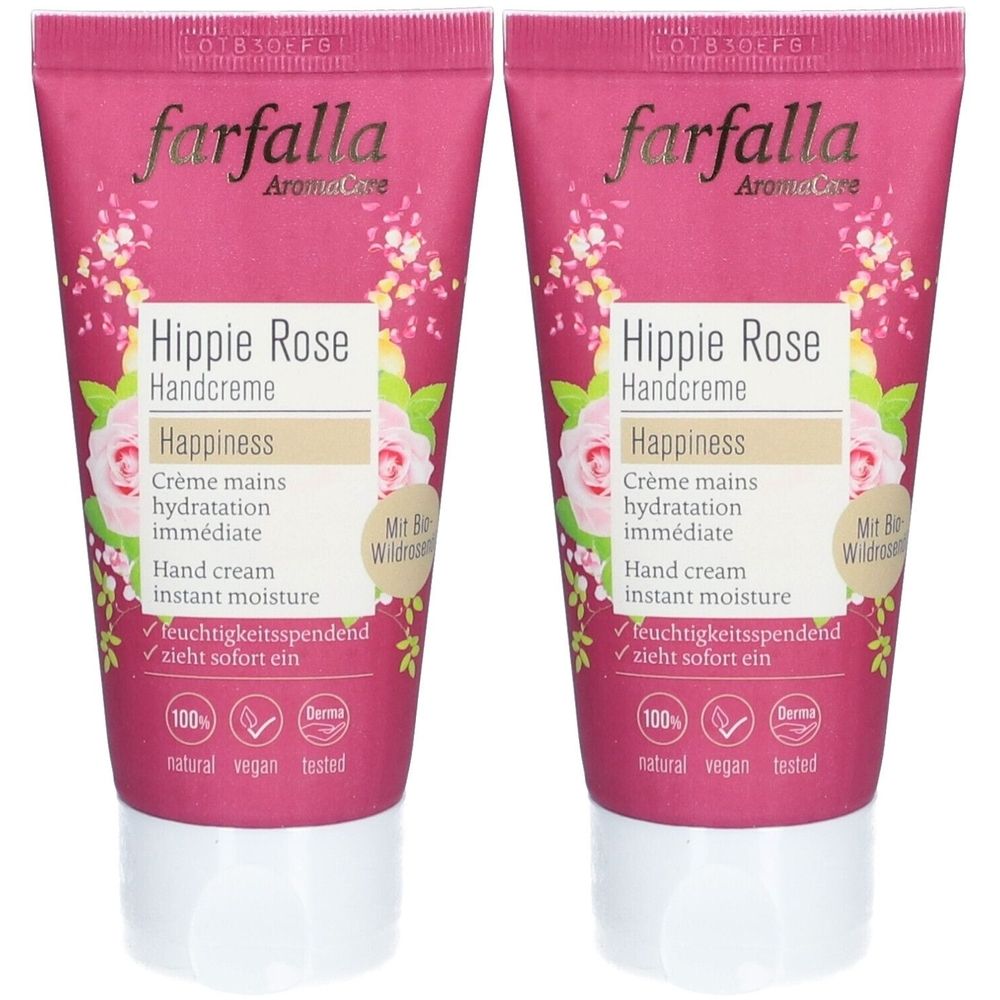 Deux tubes de crème pour les mains. Tubes roses avec un motif floral et l'inscription 'Hippie Rose Handcreme'. Logos et texte en allemand et anglais.