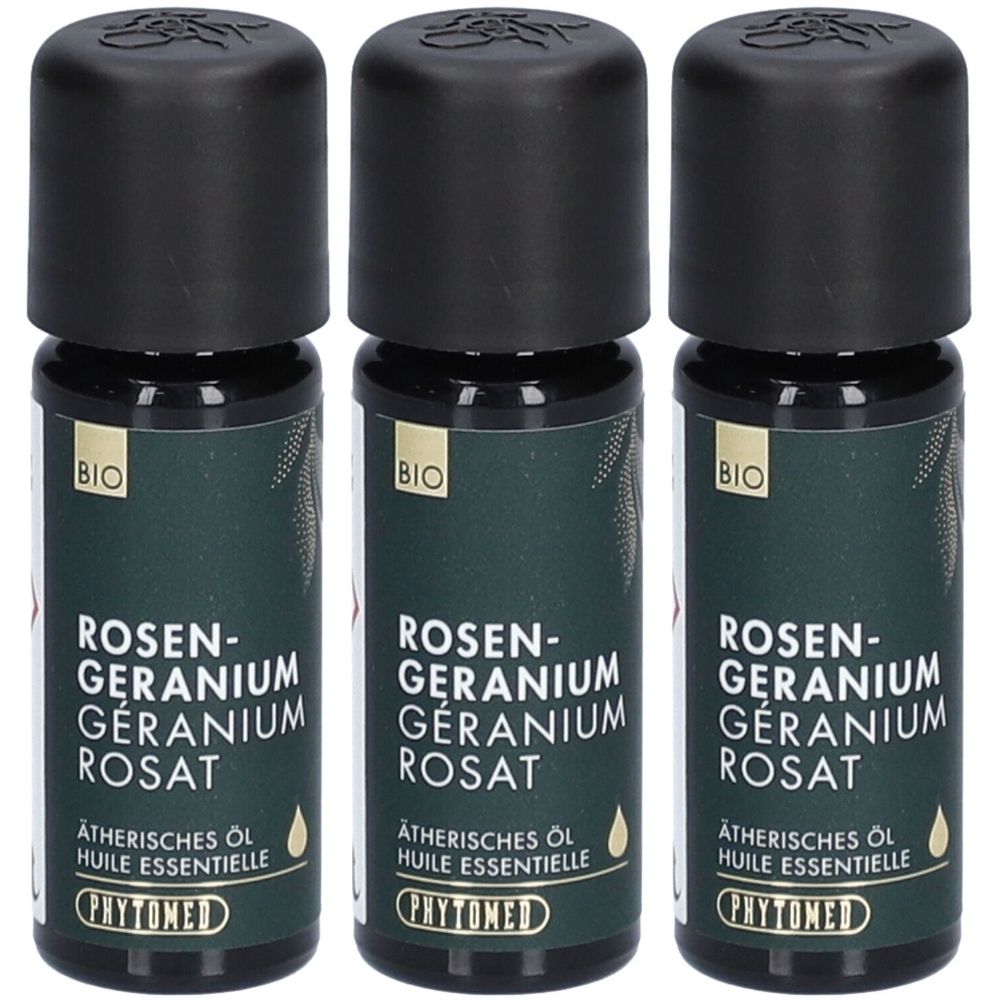Trois flacons avec bouchon noir. Inscription: Rosen-Geranium Rosat, Huile essentielle, PHYTOMED. Label BIO.