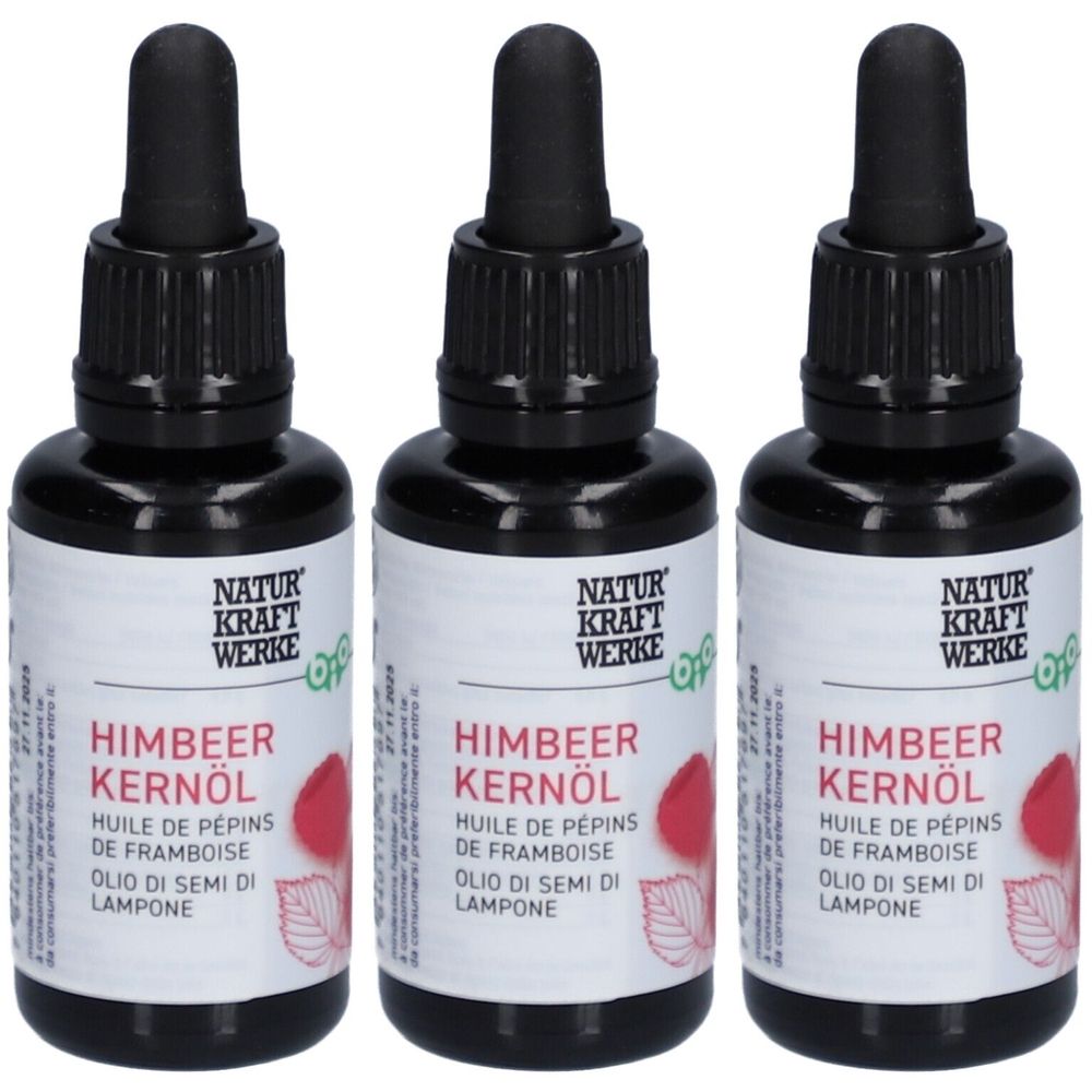 Trois flacons avec bouchon noir et pipette. Les étiquettes indiquent "NATUR KRAFT WERKE" et "HIMBEER KERNÖL".