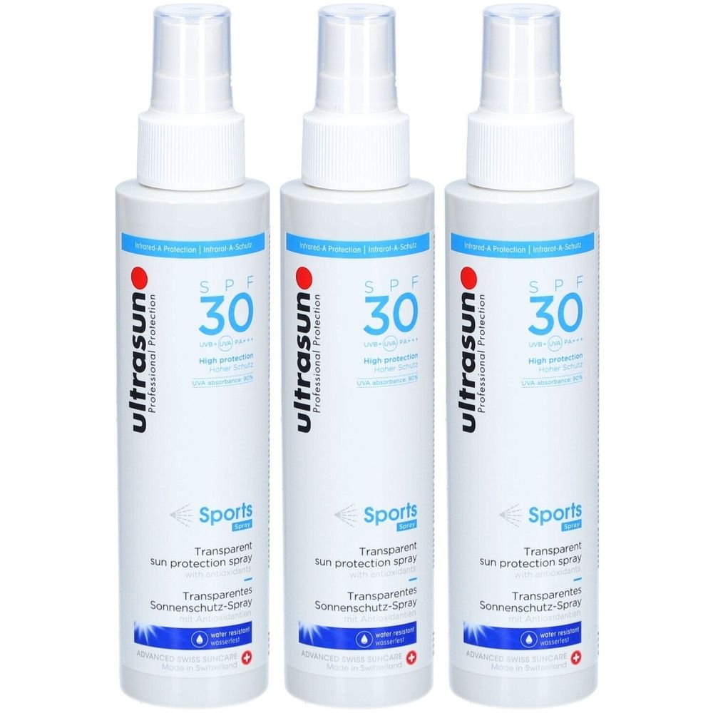 Trois flacons spray blancs avec étiquette bleue. Inscription : ultrasun, SPF 30, Sports, protection solaire transparente.
