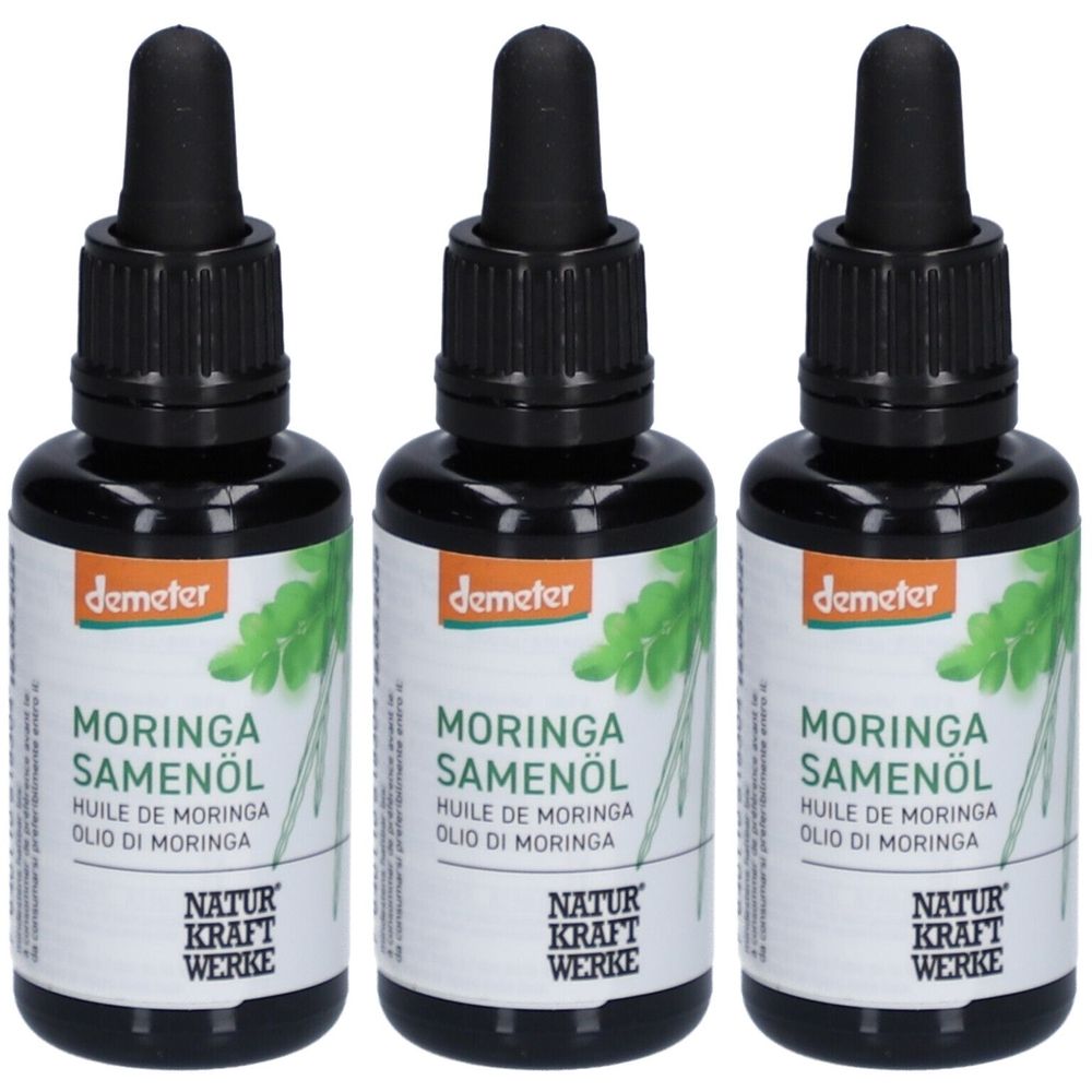 Trois flacons d'huile de moringa bio avec bouchons noirs et étiquettes. Inscription : Moringa Samenöl, logo Demeter, Naturkraftwerke.