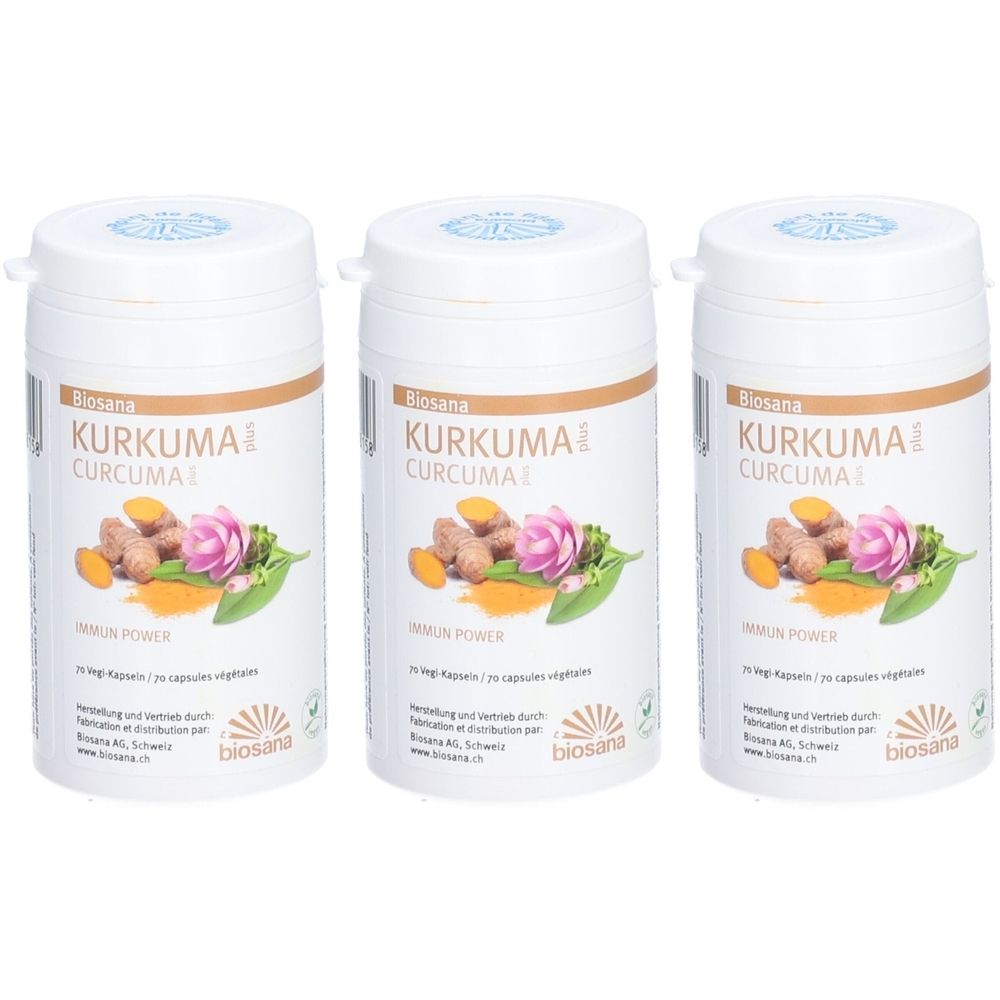 Trois contenants blancs avec l'inscription KURKUMA CURCUMA. Des illustrations de curcuma et d'une fleur sont représentées sur les contenants.