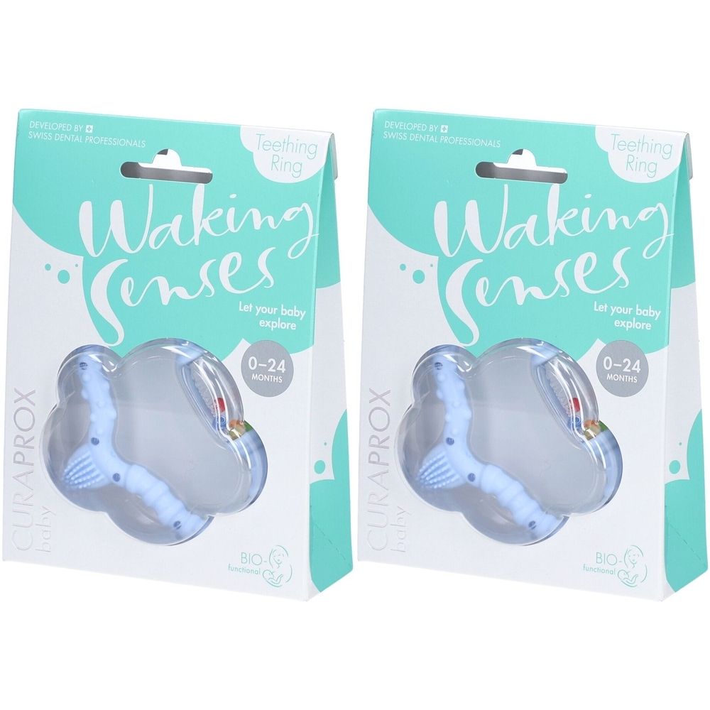 Deux anneaux de dentition CURAPROX dans leur emballage. Design bleu clair, élément transparent. Inscription : Waking Senses, 0-24 mois.