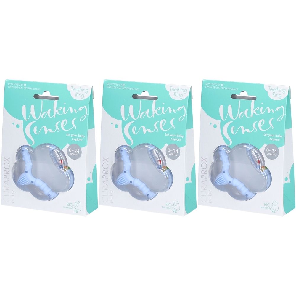 Trois anneaux de dentition CURAPROX® emballés. Forme bleu clair, éléments transparents. Inscription "Waking Senses" et "0-24 months".