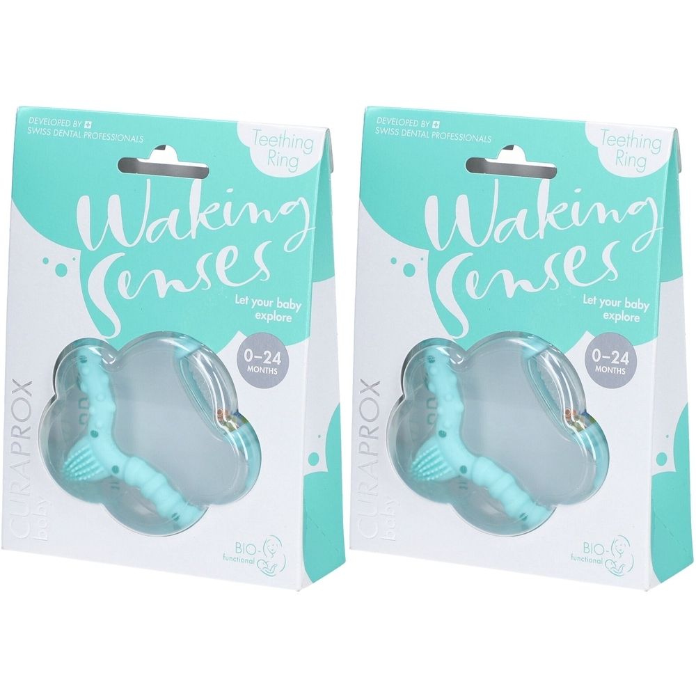 Deux emballages de bagues de dentition. Anneau de dentition turquoise dans un emballage transparent. Inscription : Waking Senses, 0-24 mois.