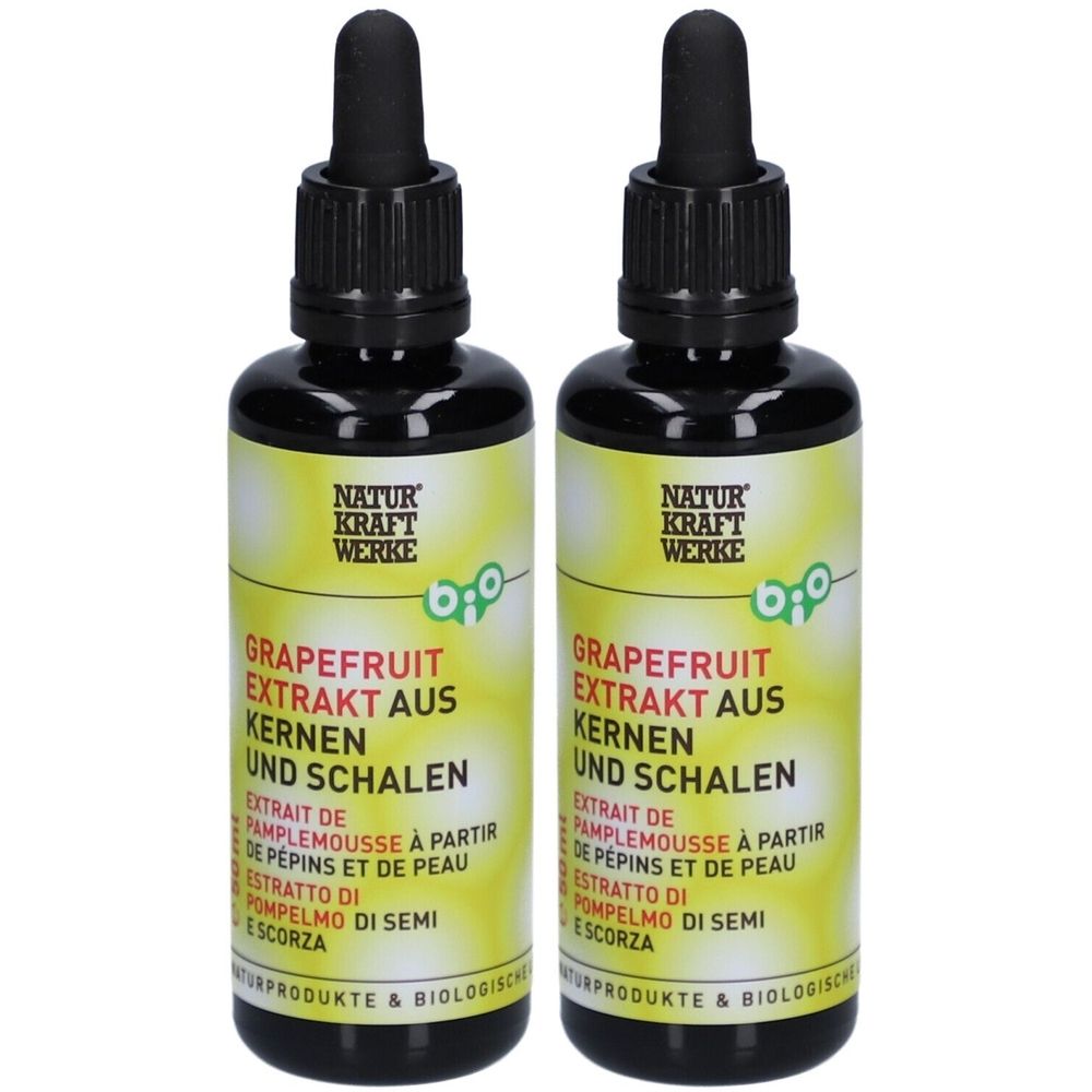 Deux flacons avec bouchons noirs et pipettes. Les étiquettes indiquent "NATUR KRAFT WERKE" et "Grapefruit Extrakt".
