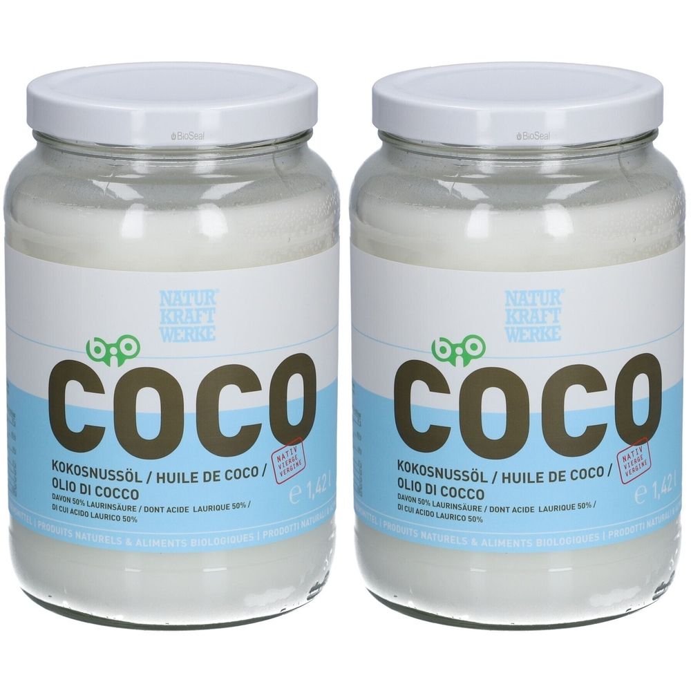 Deux pots de noix de coco avec couvercles blancs. Inscription "COCO" et "NATUR KRAFT WERKE". Texte en allemand, français et italien.