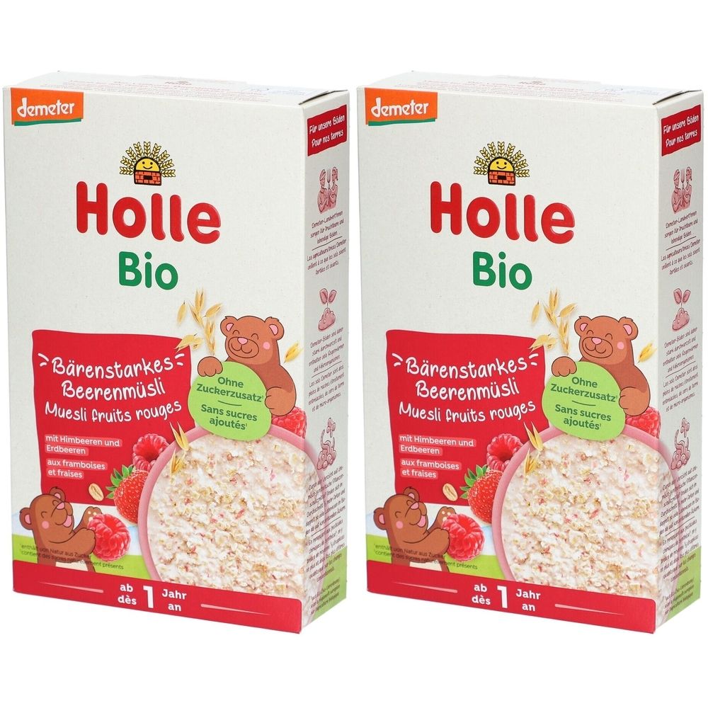 Deux boîtes de muesli aux baies Holle Bio. Inscription : Muesli aux baies, sans sucres ajoutés. Logo Demeter. Dès 1 an.