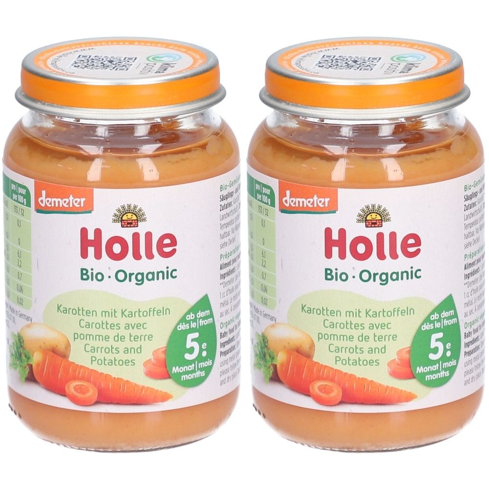 Deux pots de Holle Bio-Organic Carottes et Pommes de terre. Pots en verre avec contenu orange, couvercles orange et étiquettes avec informations et illustrations.
