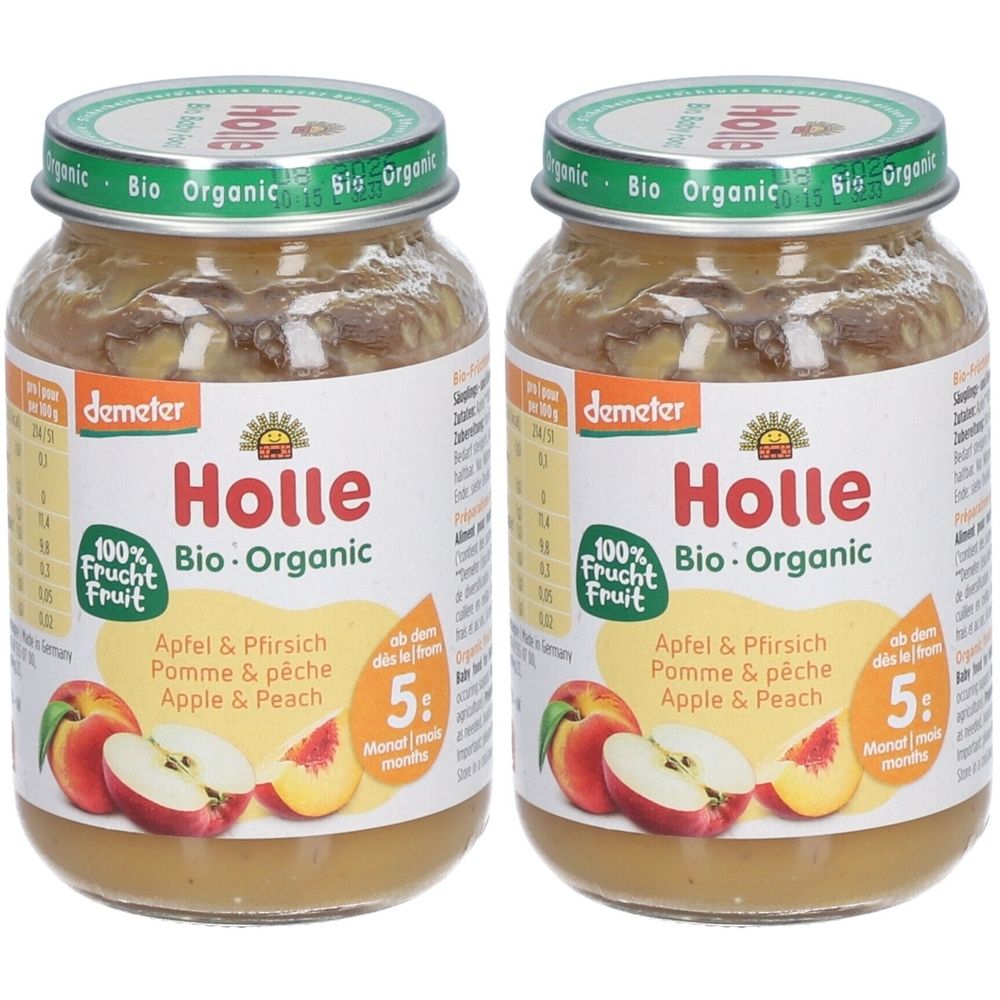 Deux pots Holle Bio-Pomme et Pêche. Étiquette avec nom du produit, 100% fruits, label Demeter. Couvercle avec label Bio. Dès 5 mois.