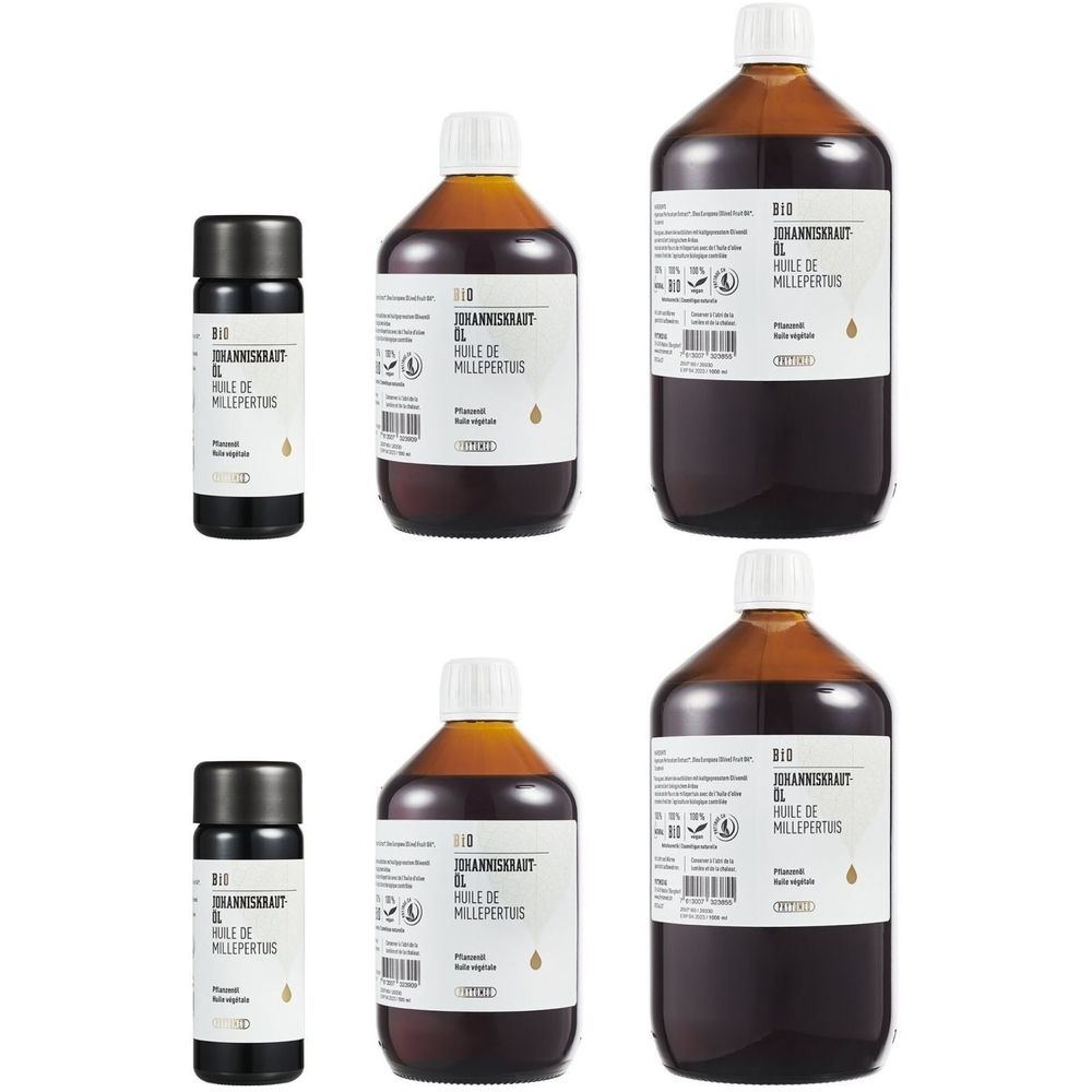 Plusieurs flacons de liquide brun. Étiquettes avec texte. Bouchons noirs et bruns.