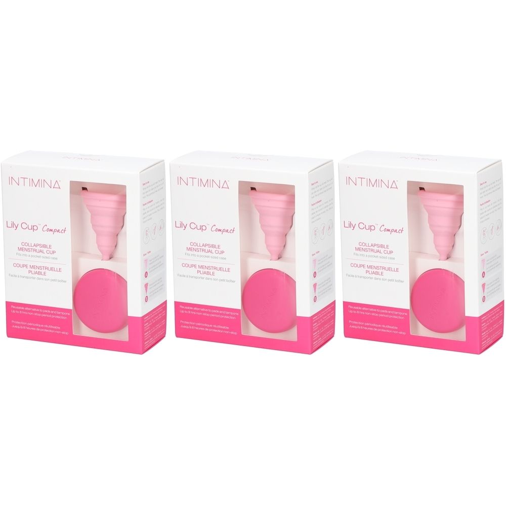 Trois boîtes de Intimina Lily Cup Compact. Chaque boîte contient une coupe menstruelle et un étui rose rond. Marque visible.