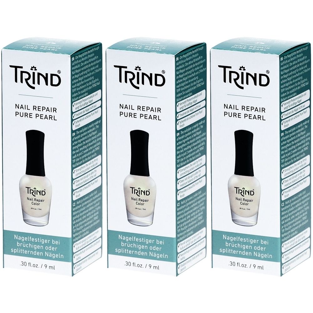Trois flacons de vernis à ongles dans des boîtes. Inscription : TRIND Nail Repair Pure Pearl. Texte : Nagelfestiger bei brüchigen oder splitternden Nägeln.