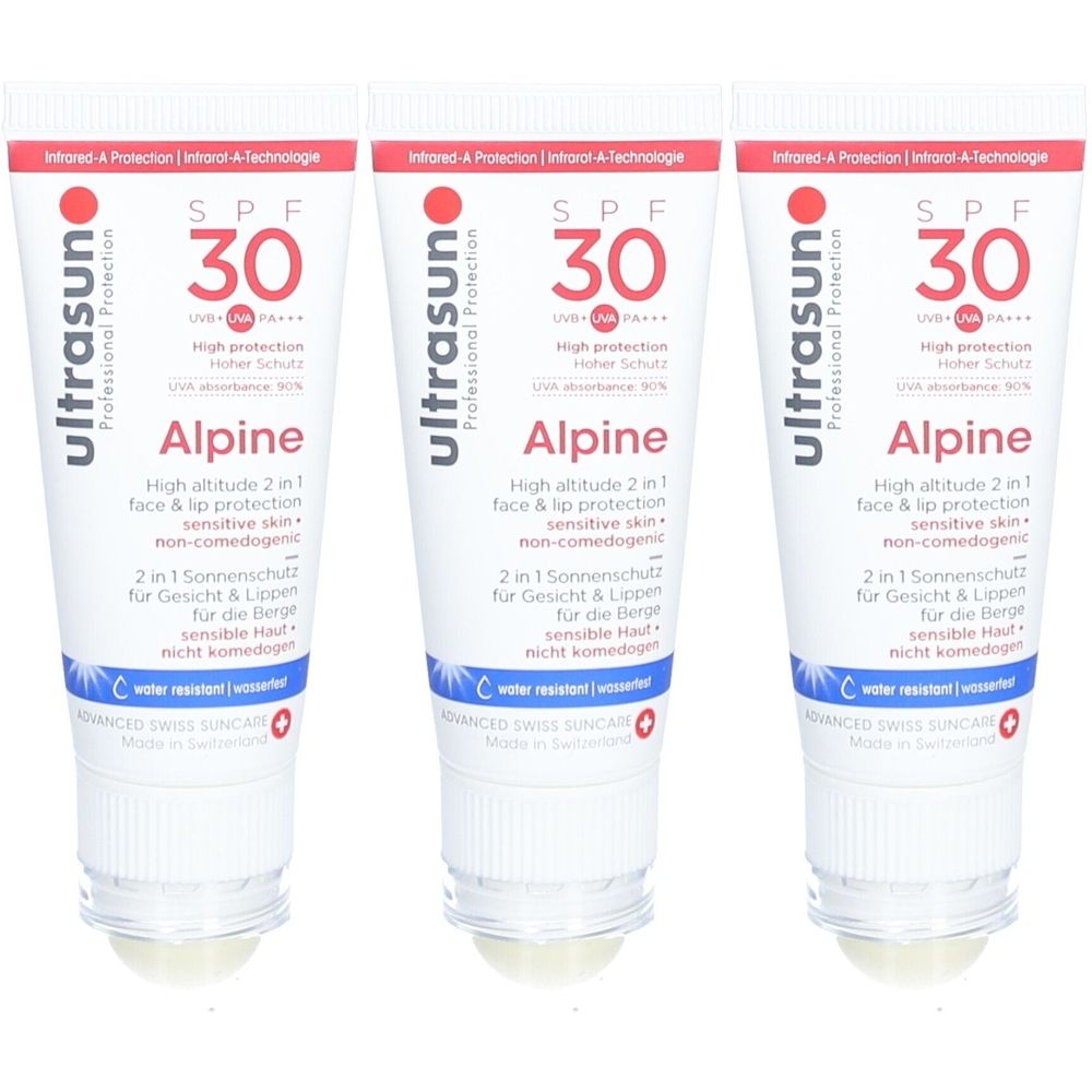 Trois tubes de protection solaire Ultrasun Alpine SPF 30. Emballage blanc et bleu avec texte rouge. Contient 'High altitude 2 in 1 face & lip protection'.