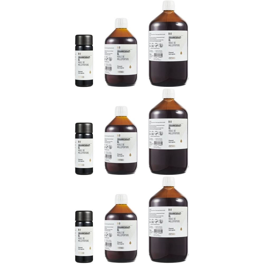 Plusieurs bouteilles et petits flacons. Liquide brun dans des flacons en verre avec des étiquettes blanches et des bouchons noirs. Étiquettes avec texte.