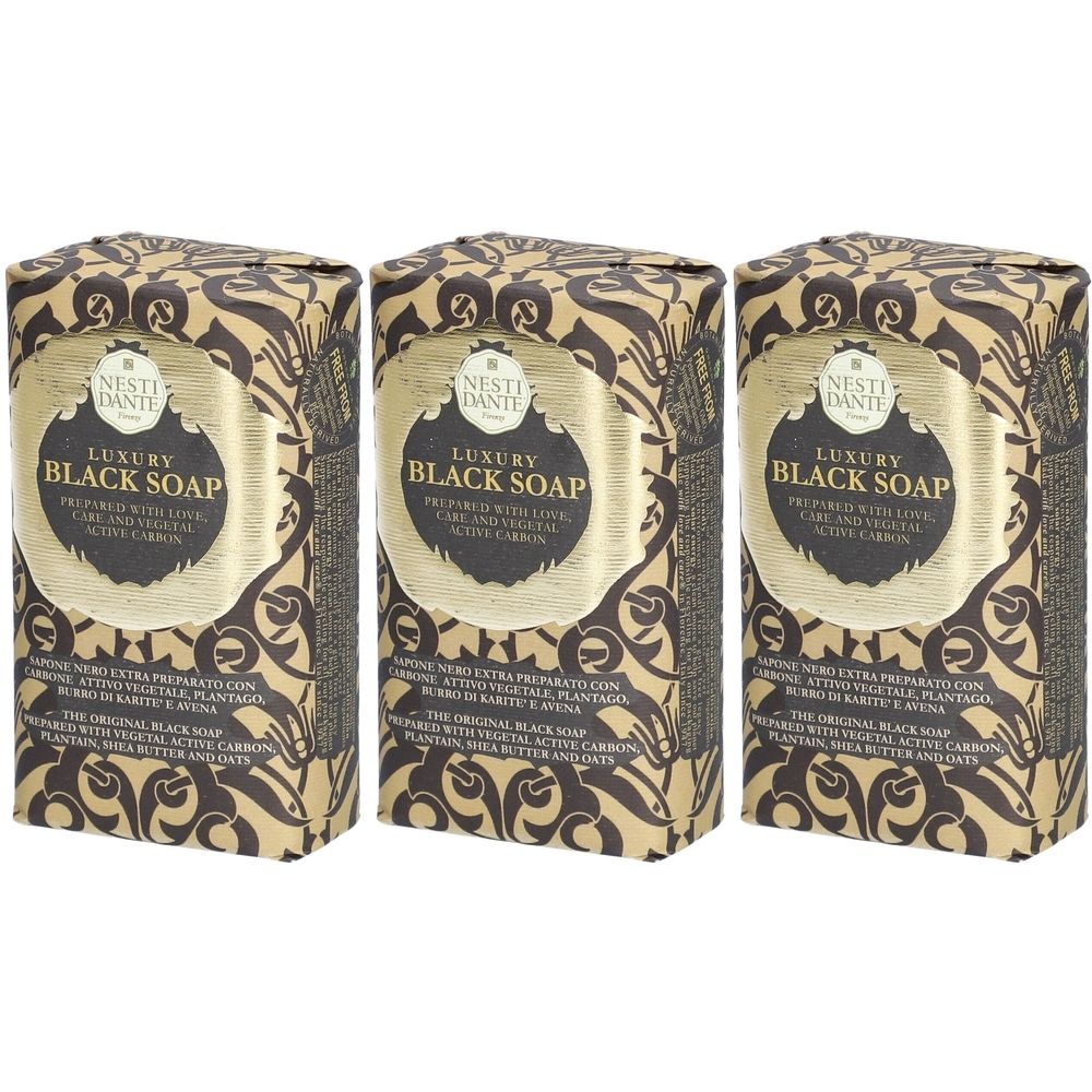 Trois savons emballés en or. Inscription : Luxury Black Soap. Marque : Nesti Dante.